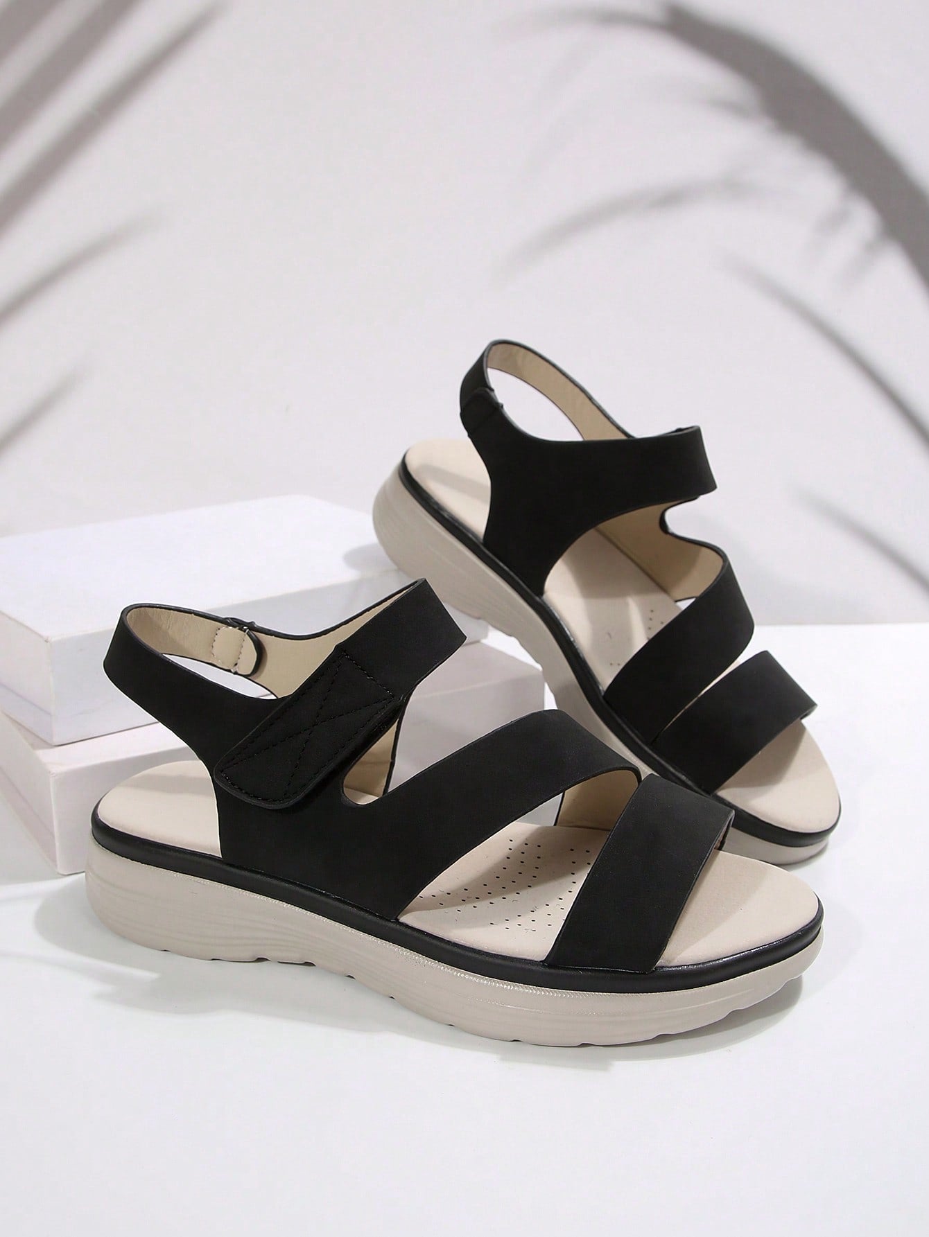 Women's plus size platform wedge sandals with hook-and-loop closure, open toe, ankle strap, and cut-out detailing in a casual beach style.