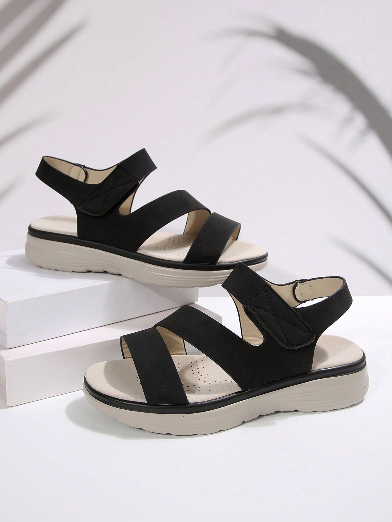 Women's plus size platform wedge sandals with hook-and-loop closure, open toe, ankle strap, and cut-out detailing in a casual beach style.