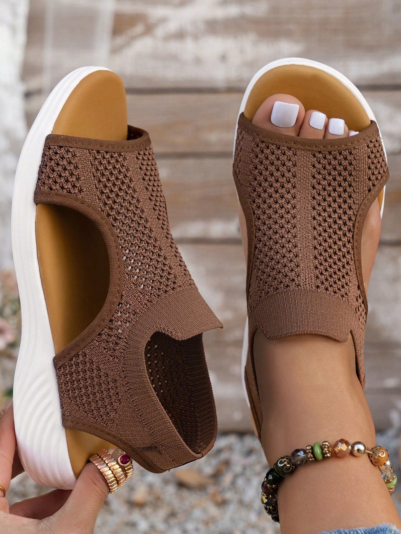 Plus size women's slip-on wedge slide sandals with open toe, low platform heel, and breathable cutout fabric upper, shown as a casual outdoor style sandal.