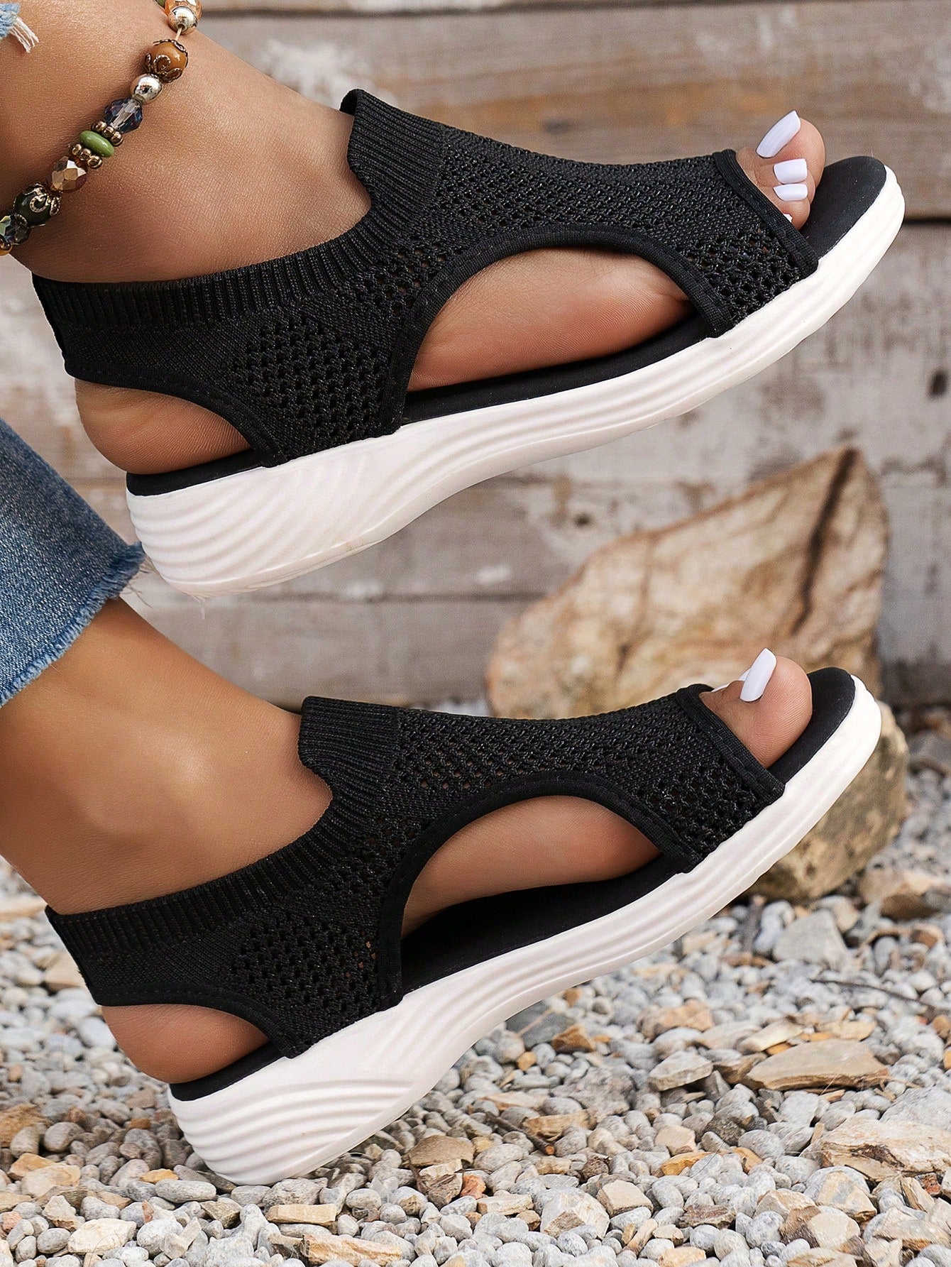 Plus size women's slip-on wedge slide sandals with open toe, low platform heel, and breathable cutout fabric upper, shown as a casual outdoor style sandal.