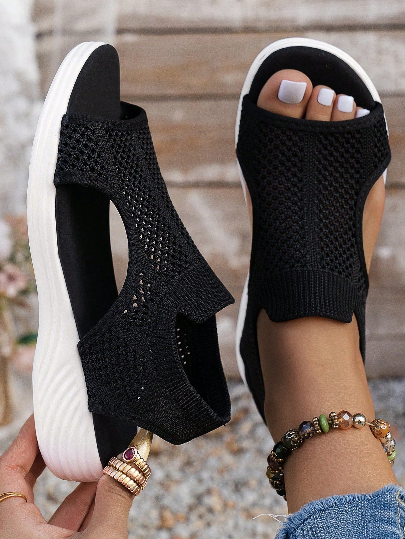 Plus size women's slip-on wedge slide sandals with open toe, low platform heel, and breathable cutout fabric upper, shown as a casual outdoor style sandal.