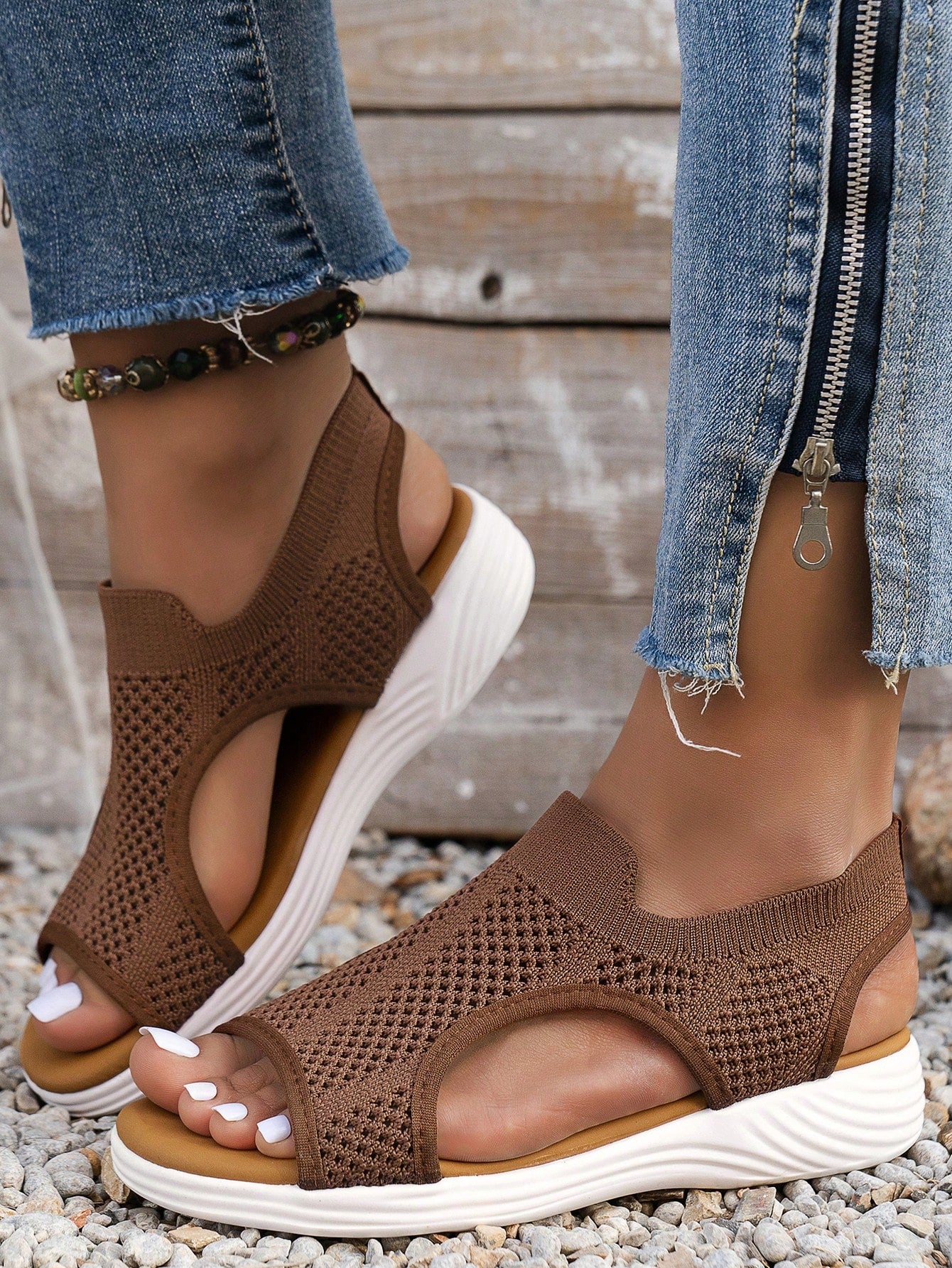 Plus size women's slip-on wedge slide sandals with open toe, low platform heel, and breathable cutout fabric upper, shown as a casual outdoor style sandal.