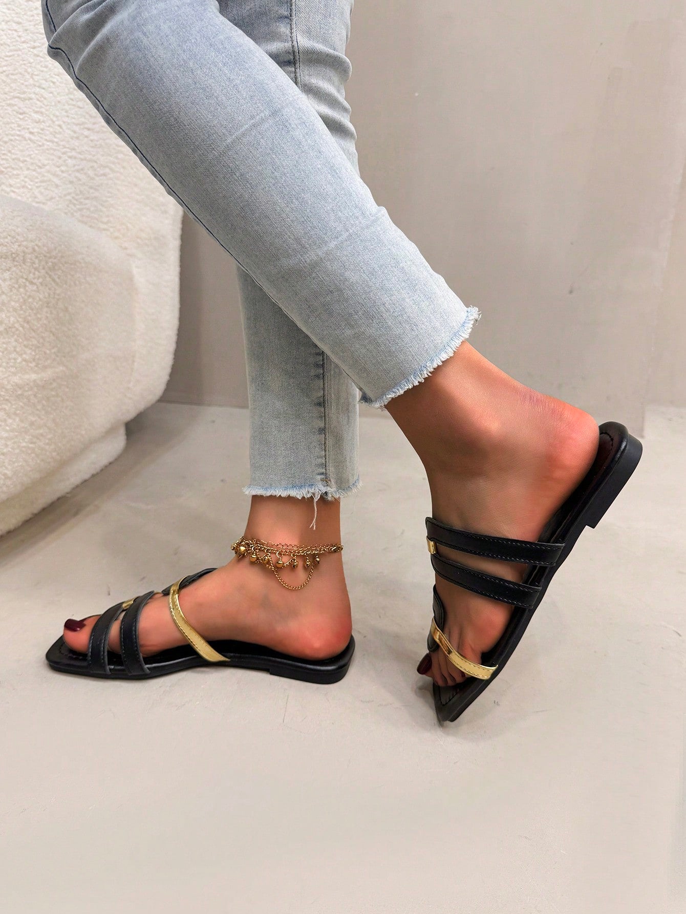 Women's flat slide sandals with open square toe and cut-out design in black, casual bohemian style for outdoor walking and beach wear.