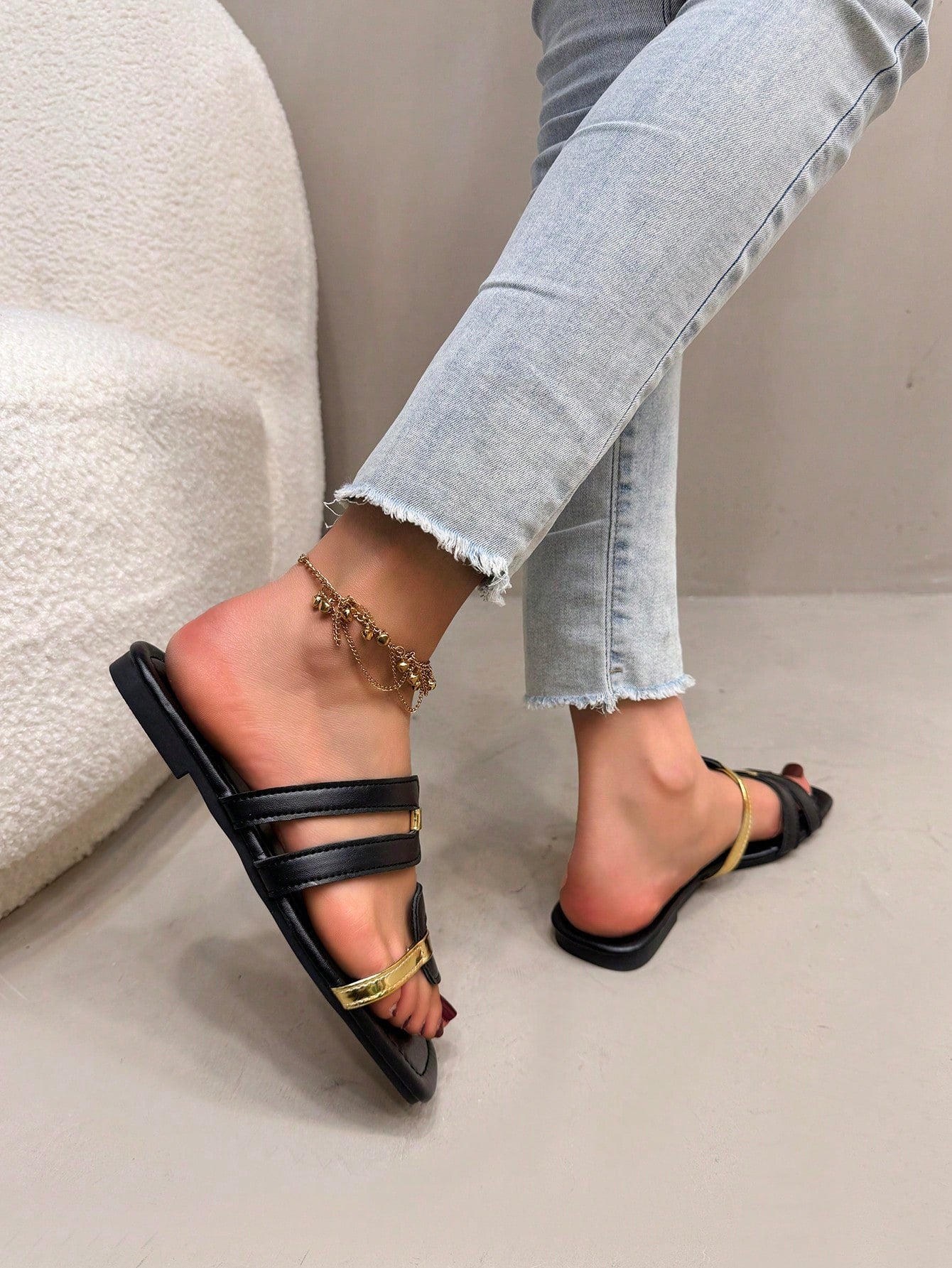 Women's flat slide sandals with open square toe and cut-out design in black, casual bohemian style for outdoor walking and beach wear.