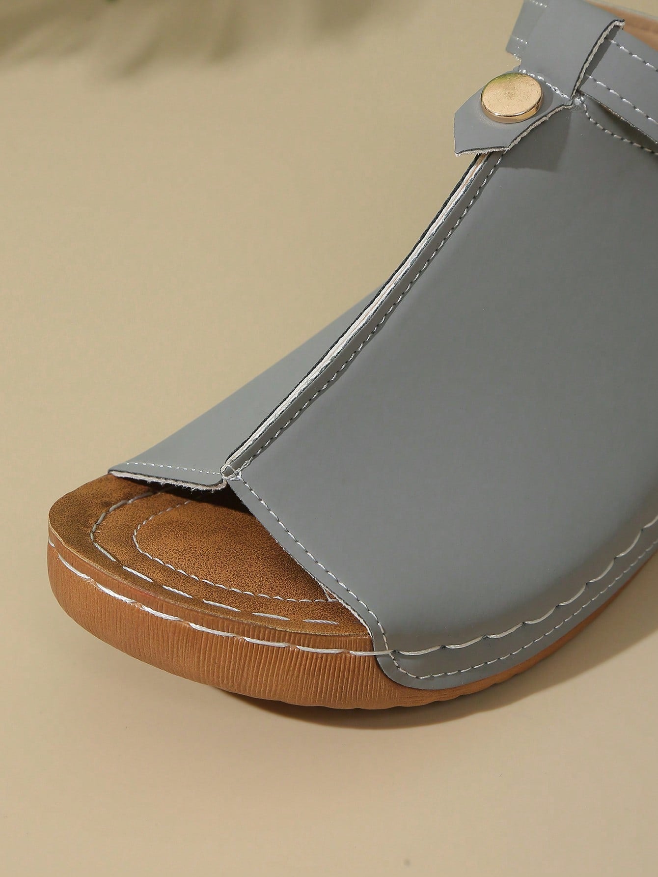 Women's open-toe platform wedge beach sandals with thick sole, stitching detail, floral accents, buckle closure, and removable adjustable shoelaces.