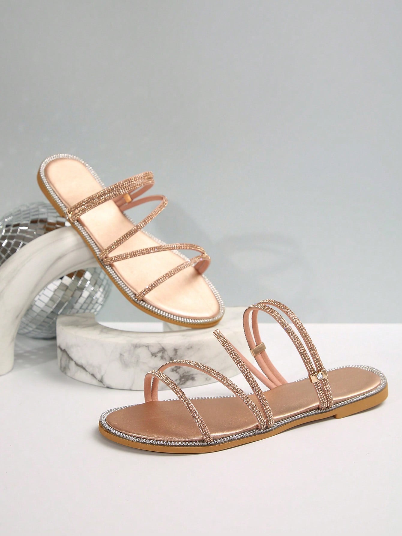 Women's flat open-toe sandals featuring braided multi-strap detailing in a solid color, designed for everyday wear, beach outings, parties, and summer events.