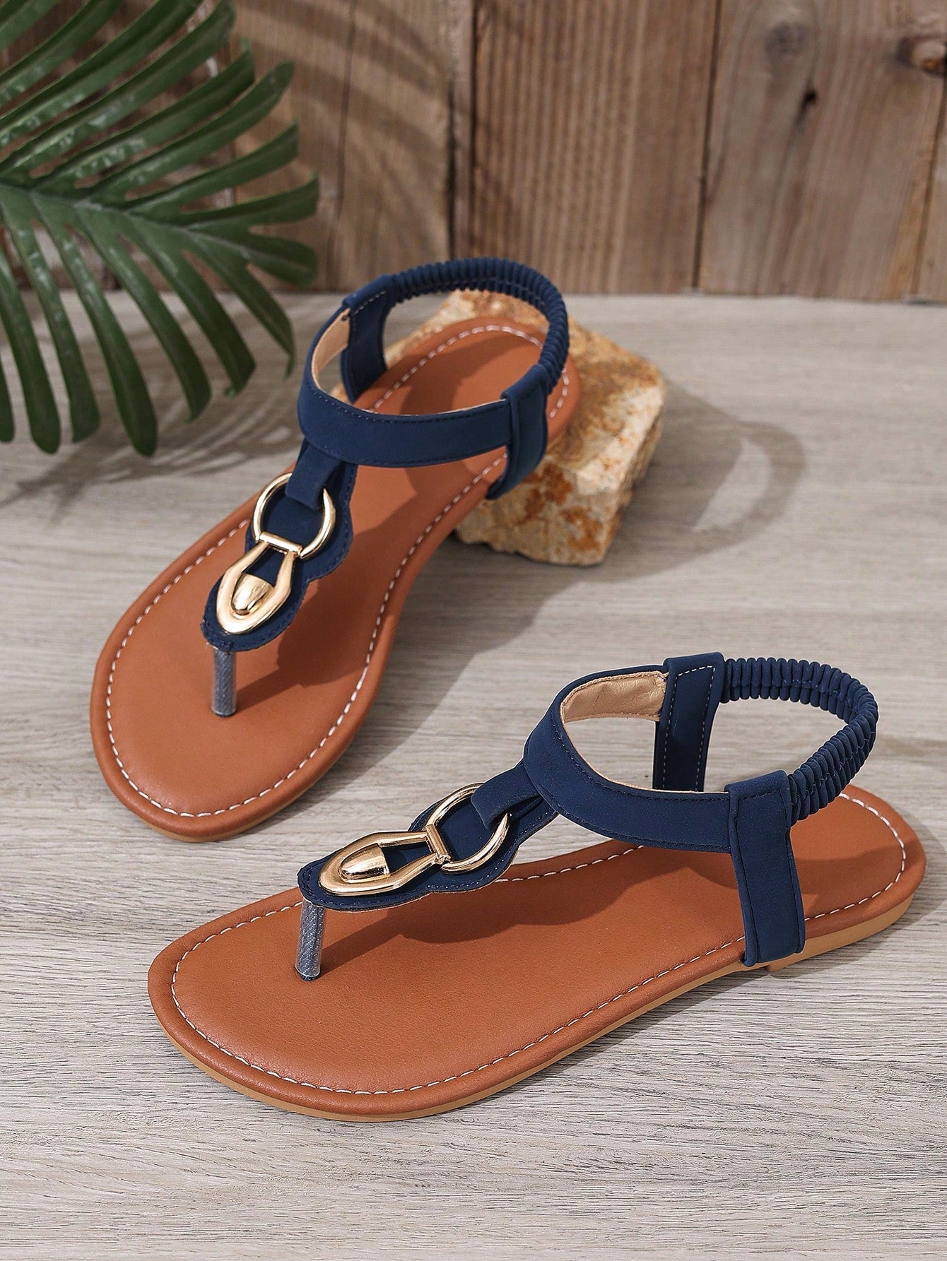 Women's royal blue flat thong slingback sandals with metal buckle detail and toe post design, handmade style flip flops for summer beach, party, wedding, and outdoor wear.