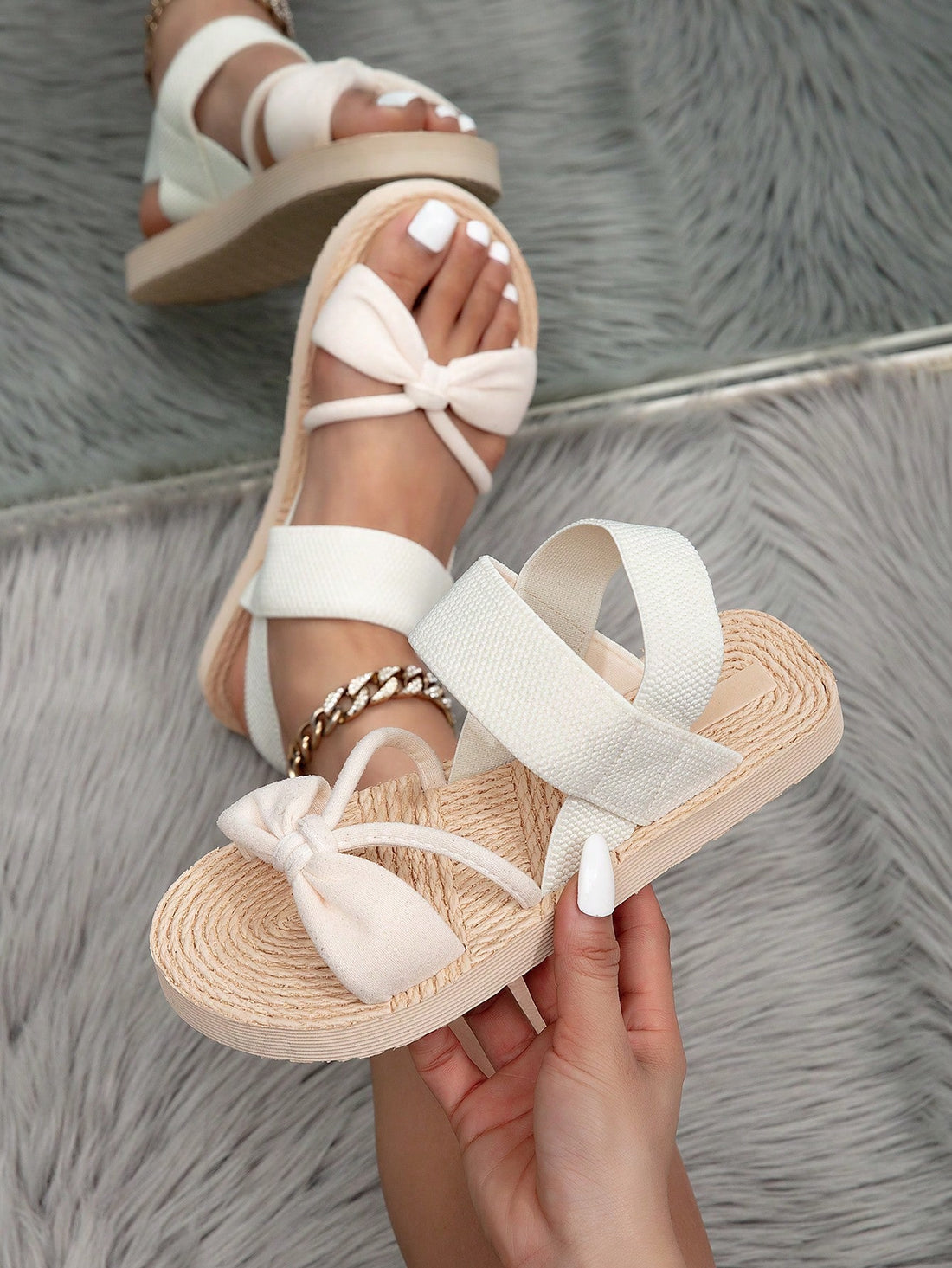 Women's beige flat slide sandals with ruched asymmetrical colorblock design and criss cross elastic fabric straps, casual slip-on style for outdoor wear.
