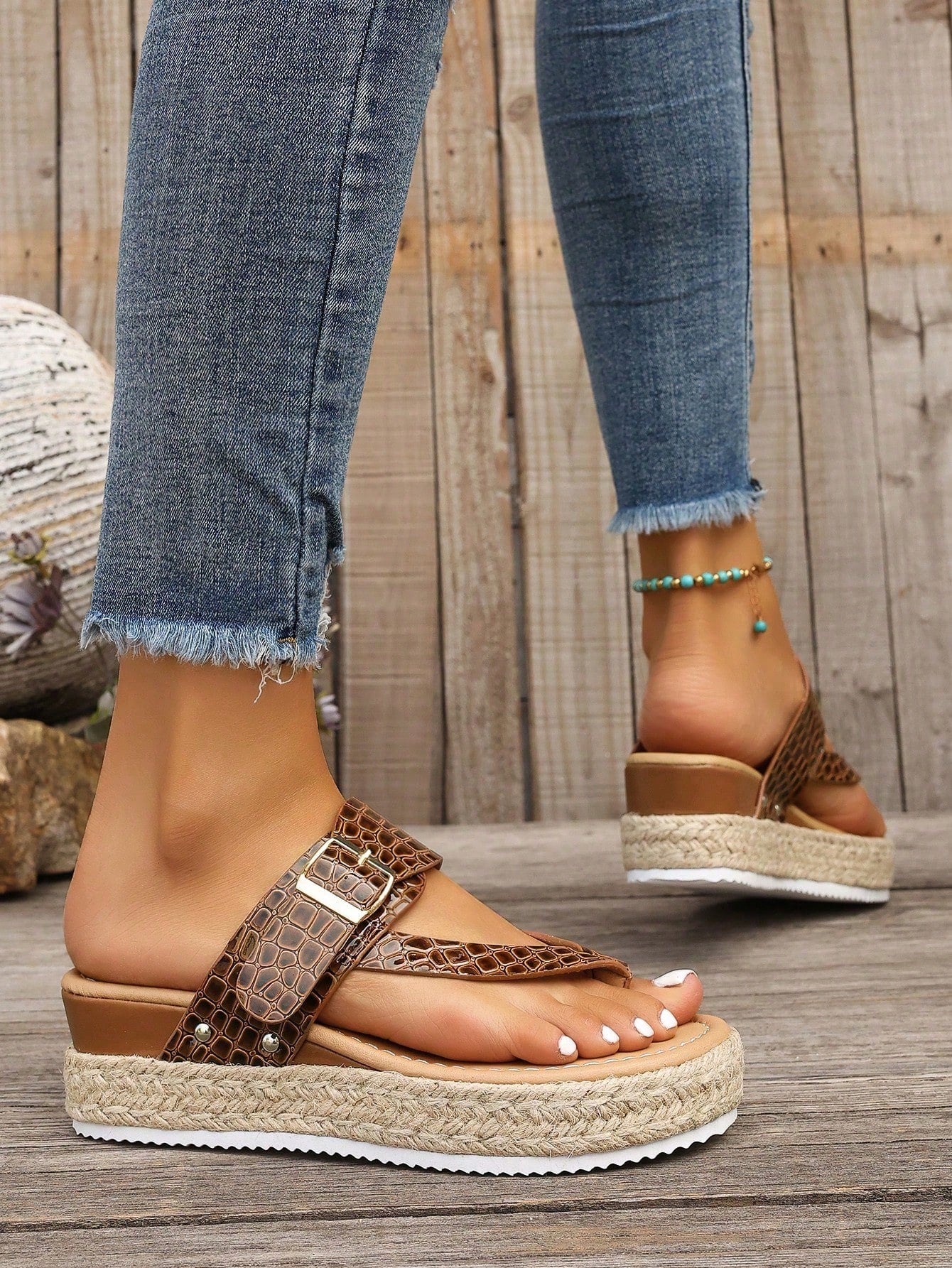 Women's thick sole flip flop sandals with adjustable buckle strap, toe post design, and flatform mid heel in a casual vacation style.