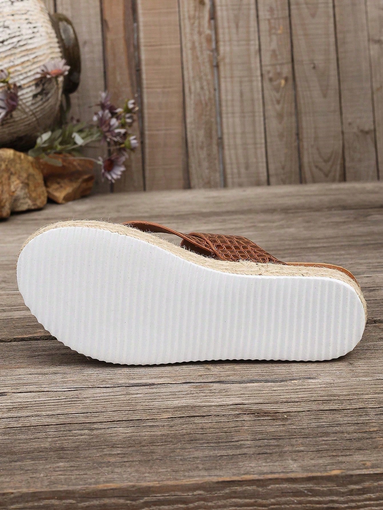 Women's thick sole flip flop sandals with adjustable buckle strap, toe post design, and flatform mid heel in a casual vacation style.