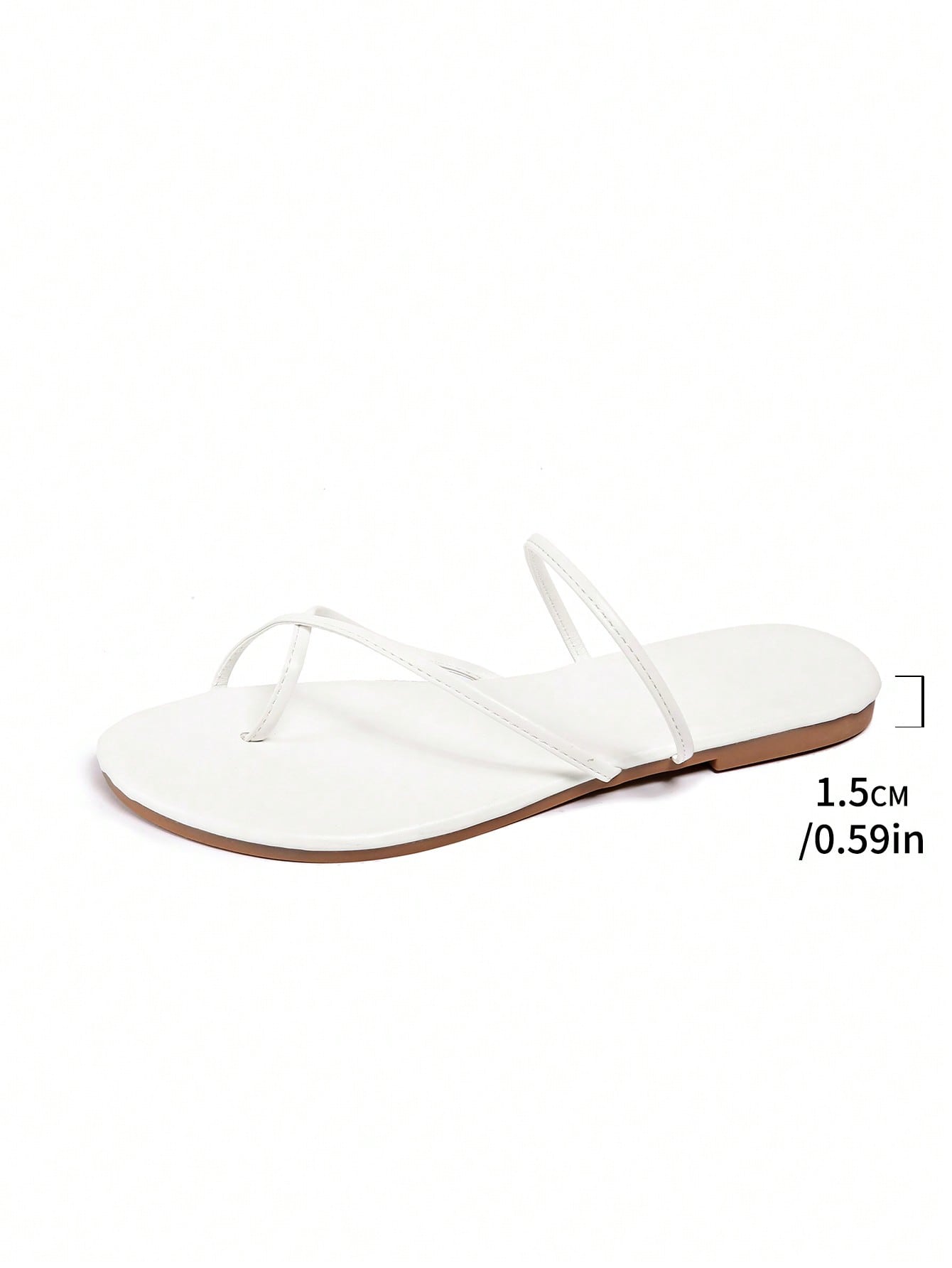 Women’s gold thong flat sandals with strappy asymmetrical design, suitable for outdoor and beach wear