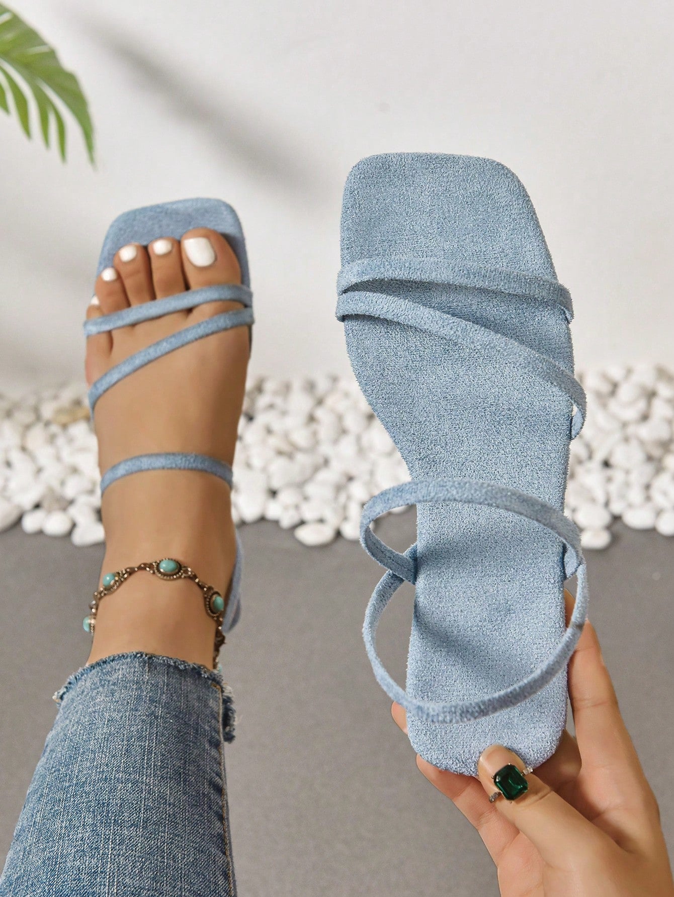 Women's flat sandals with a square open toe, crisscross front straps, and an elastic ankle strap, suitable for casual summer outdoor and beach vacation wear.