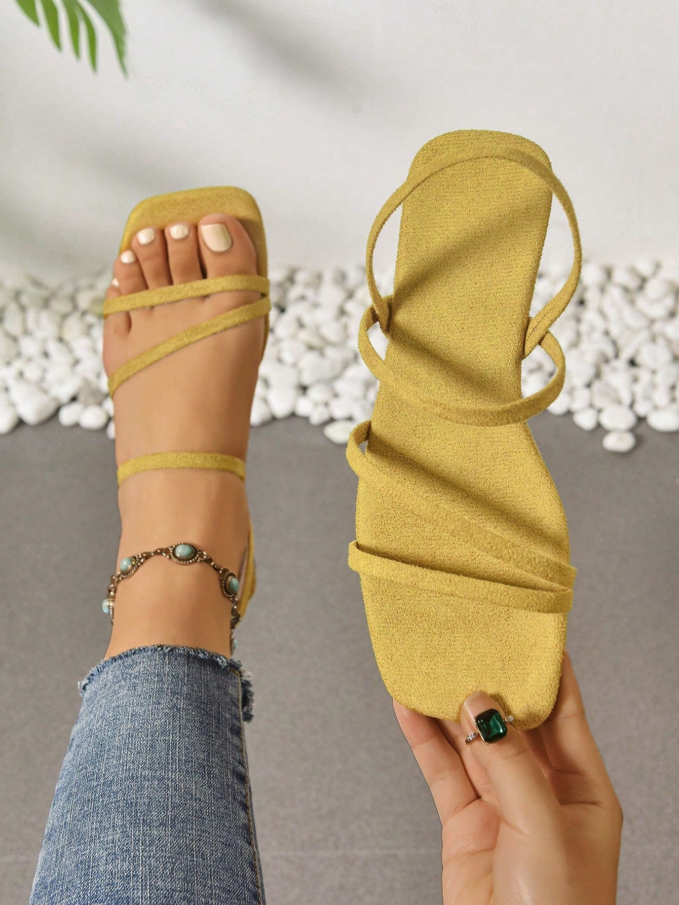 Women's flat sandals with a square open toe, crisscross front straps, and an elastic ankle strap, suitable for casual summer outdoor and beach vacation wear.