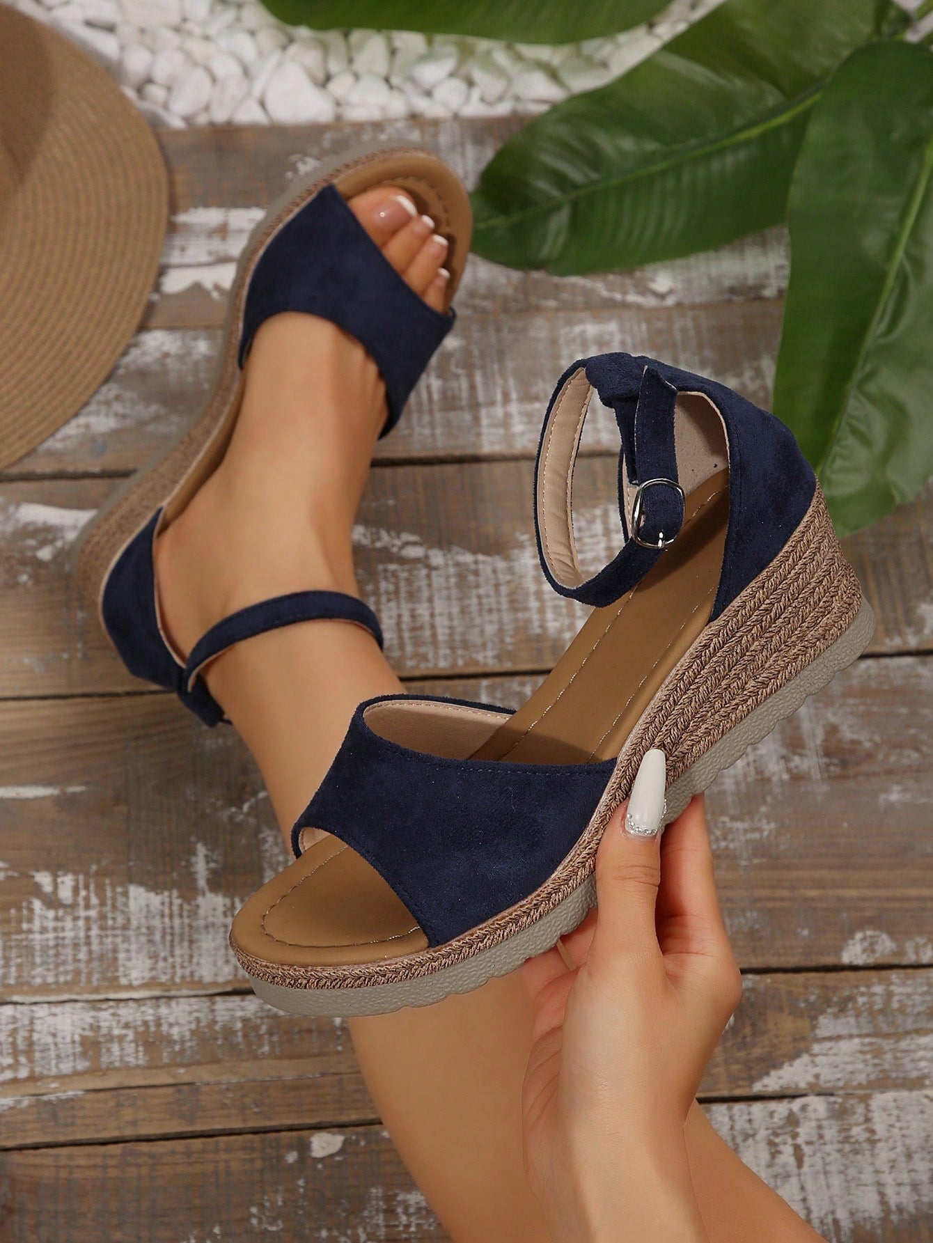 Women's classic wedge sandals featuring a peep open toe, ankle strap with buckle closure, mid wedge heel, and large bow detail in a bohemian beach style.
