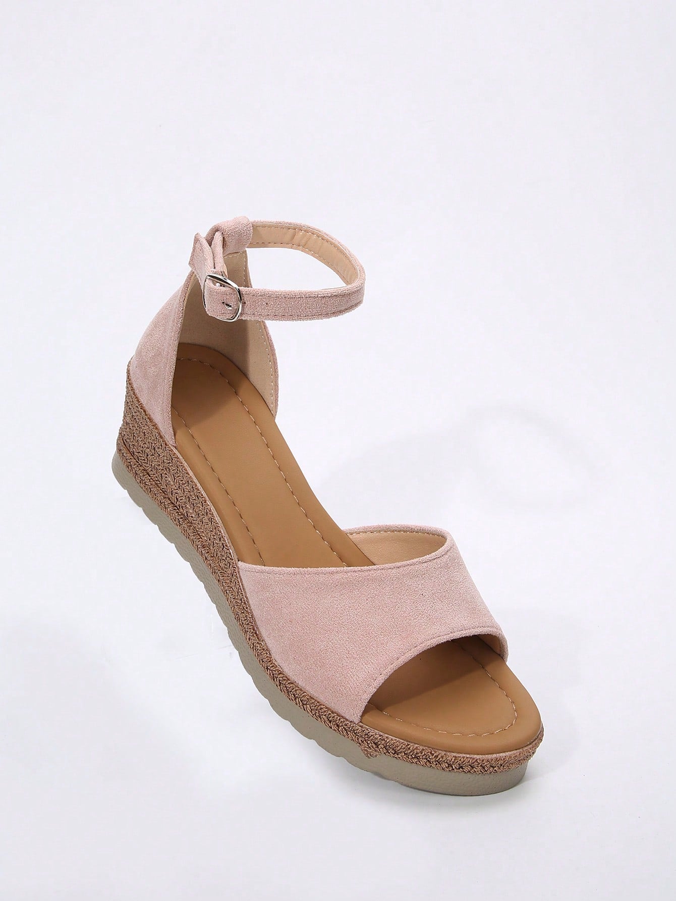 Women's classic wedge sandals featuring a peep open toe, ankle strap with buckle closure, mid wedge heel, and large bow detail in a bohemian beach style.
