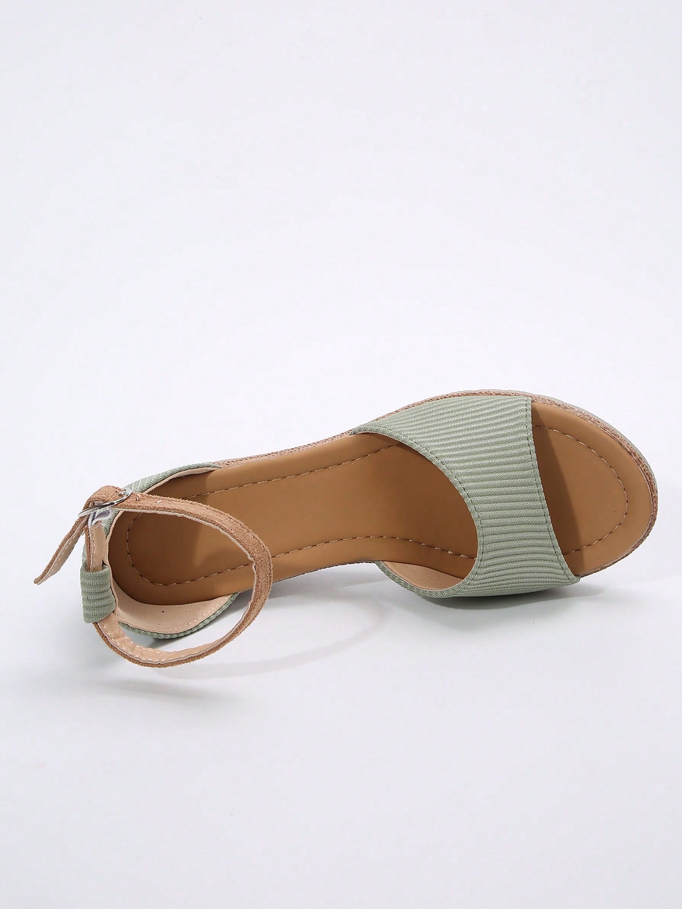 Women's classic wedge sandals featuring a peep open toe, ankle strap with buckle closure, mid wedge heel, and large bow detail in a bohemian beach style.