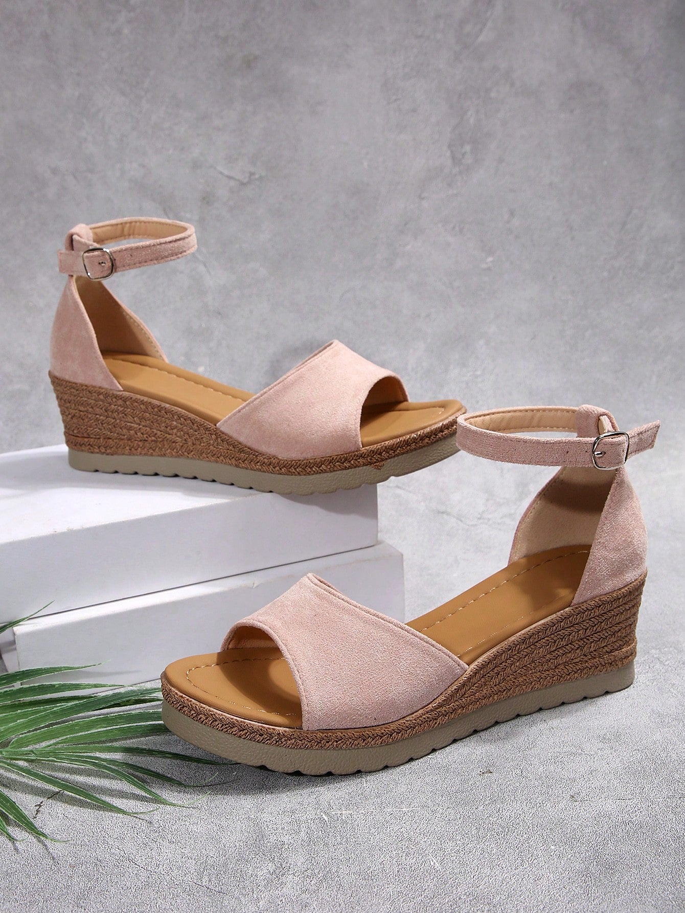 Women's classic wedge sandals featuring a peep open toe, ankle strap with buckle closure, mid wedge heel, and large bow detail in a bohemian beach style.
