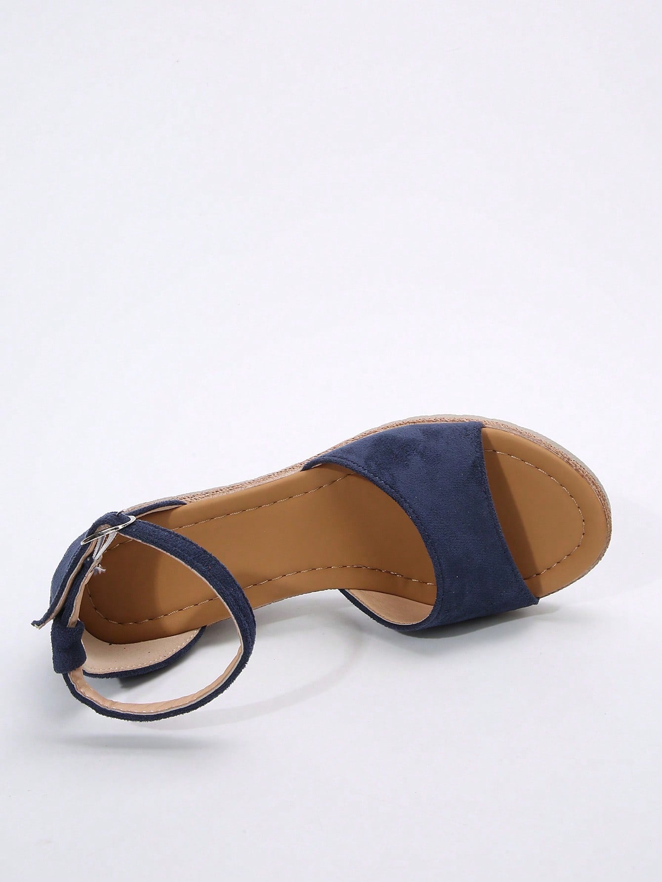 Women's classic wedge sandals featuring a peep open toe, ankle strap with buckle closure, mid wedge heel, and large bow detail in a bohemian beach style.