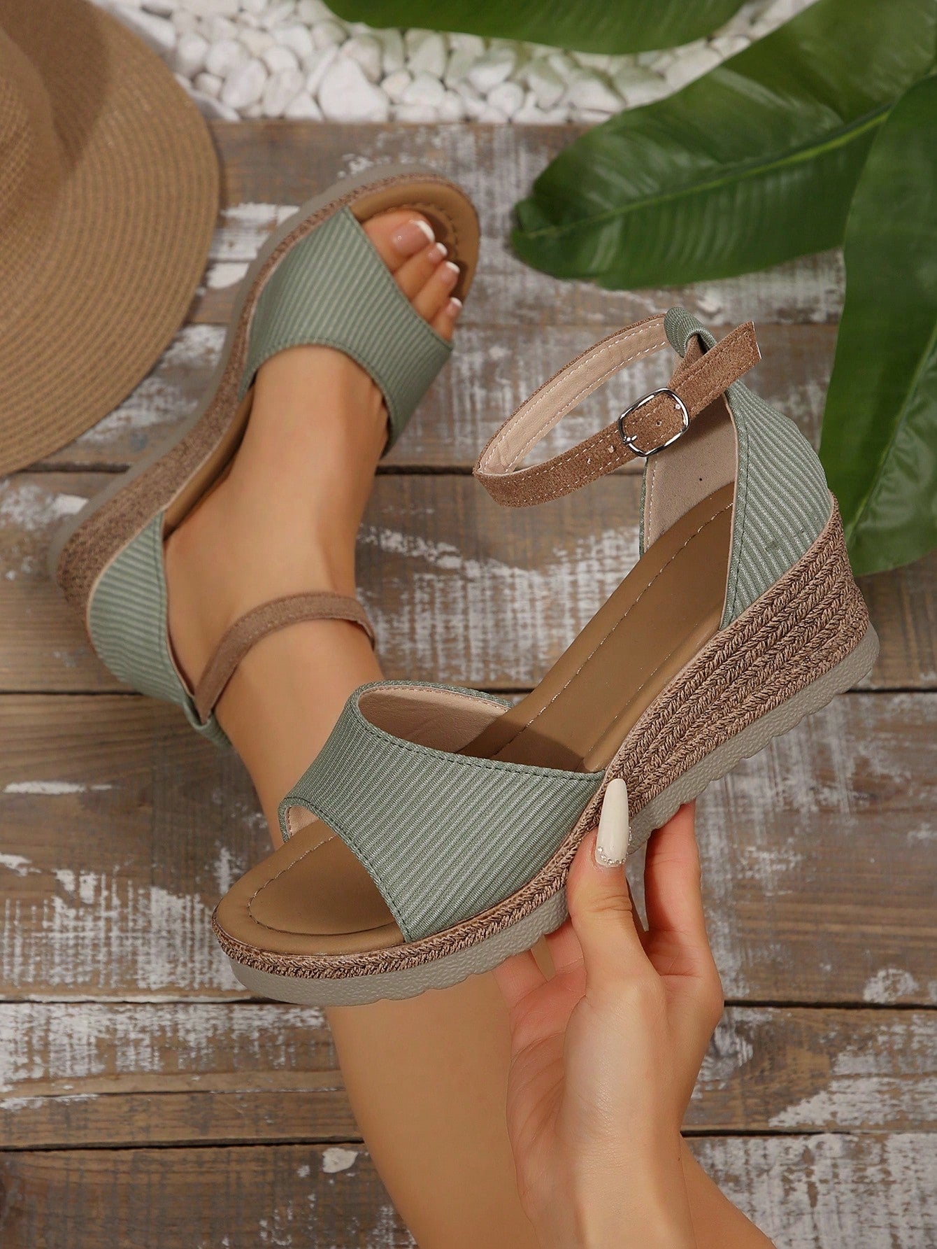 Women's classic wedge sandals featuring a peep open toe, ankle strap with buckle closure, mid wedge heel, and large bow detail in a bohemian beach style.