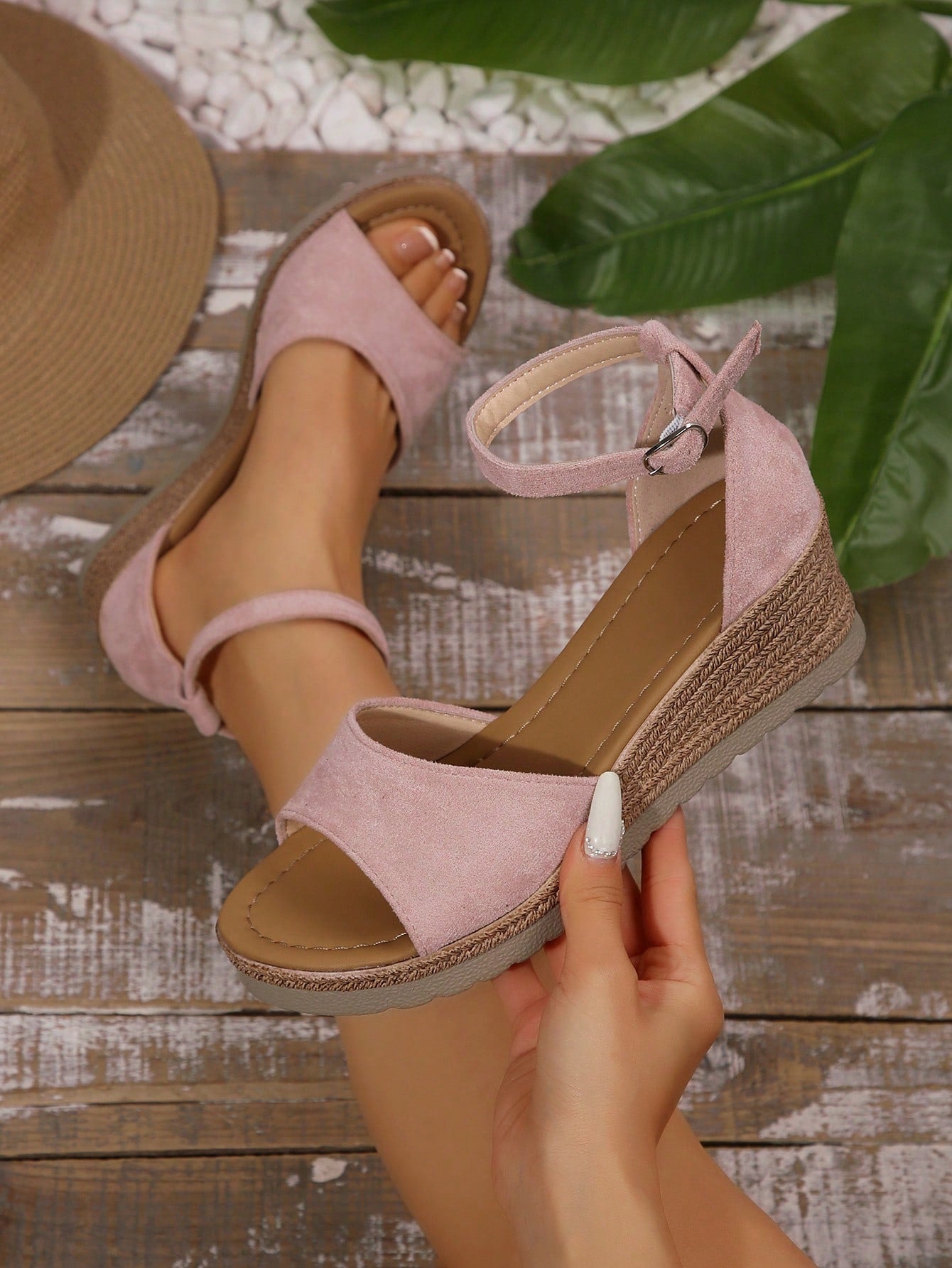 Women's classic wedge sandals featuring a peep open toe, ankle strap with buckle closure, mid wedge heel, and large bow detail in a bohemian beach style.