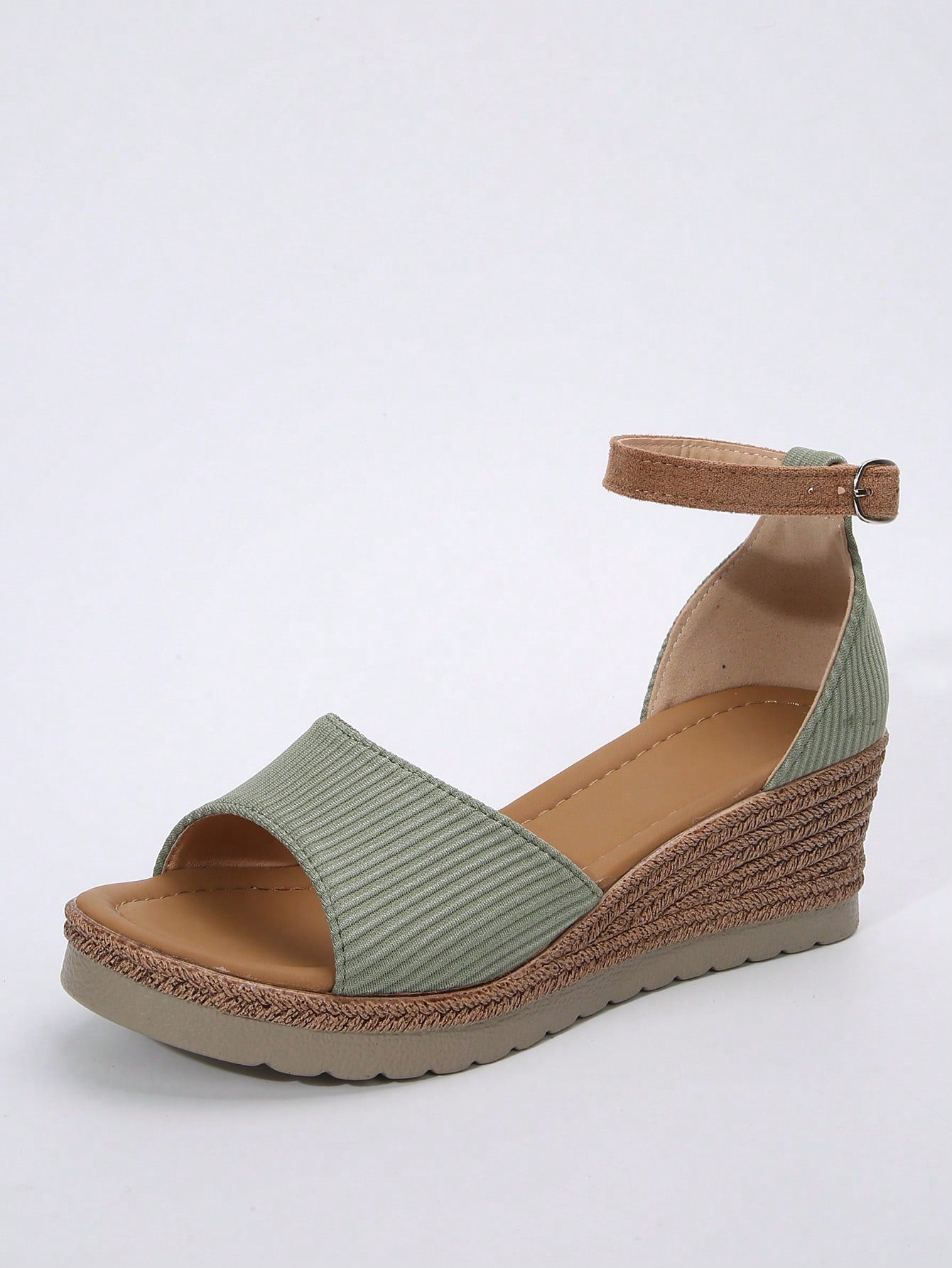 Women's classic wedge sandals featuring a peep open toe, ankle strap with buckle closure, mid wedge heel, and large bow detail in a bohemian beach style.