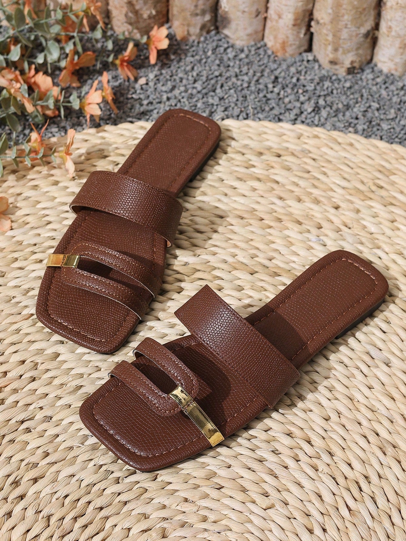 Women's yellow open-toe flat slide sandals featuring a cut-out design and textured plain pattern for casual beach and daily wear.