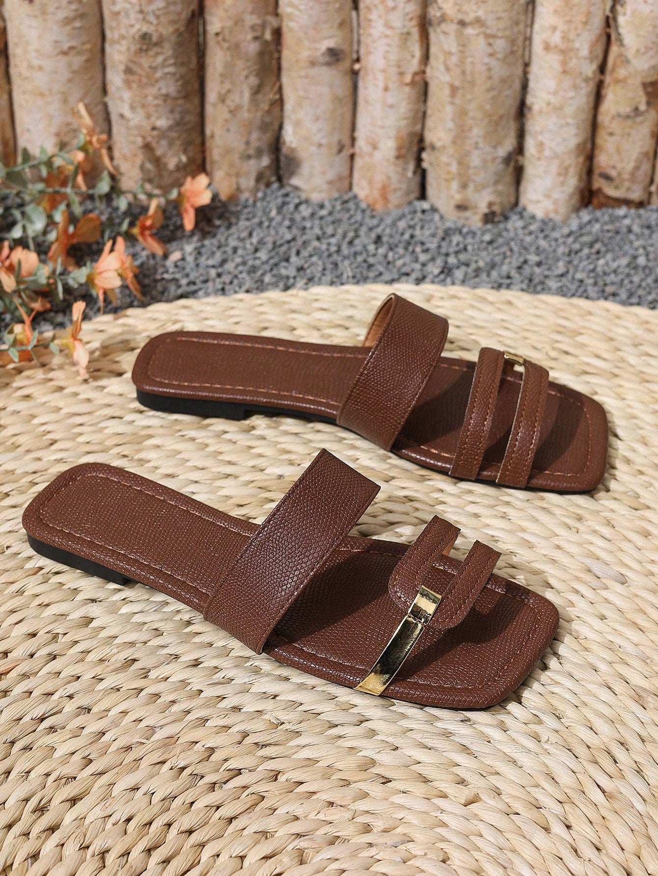 Women's yellow open-toe flat slide sandals featuring a cut-out design and textured plain pattern for casual beach and daily wear.