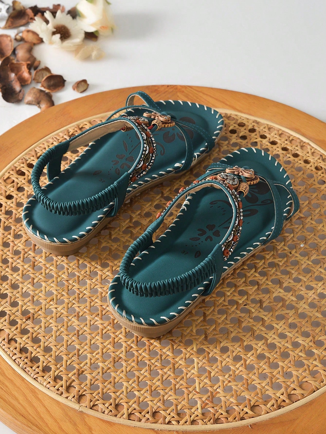 Women's malachite green bohemian flat thong sandals with rhinestone toe ring and slip-on design for beach and summer wear