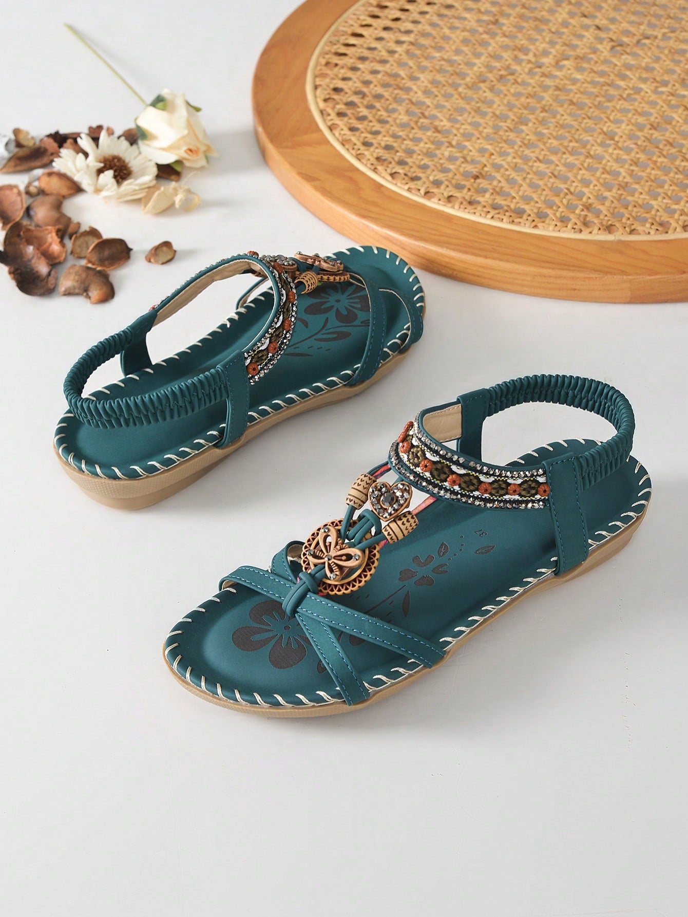 Women's malachite green bohemian flat thong sandals with rhinestone toe ring and slip-on design for beach and summer wear