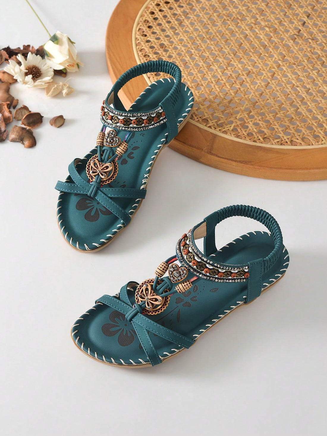 Women's malachite green bohemian flat thong sandals with rhinestone toe ring and slip-on design for beach and summer wear