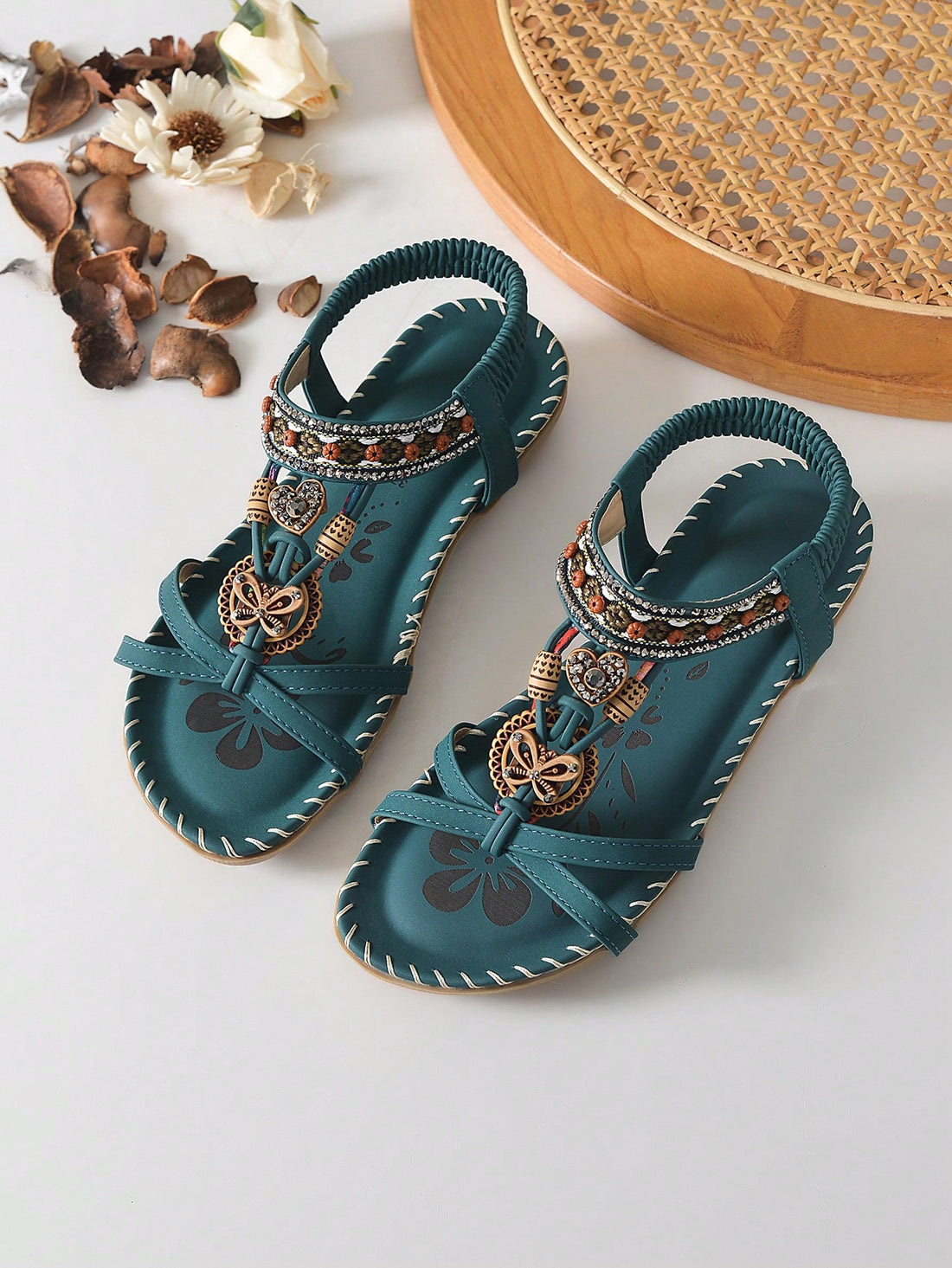 Women's malachite green bohemian flat thong sandals with rhinestone toe ring and slip-on design for beach and summer wear