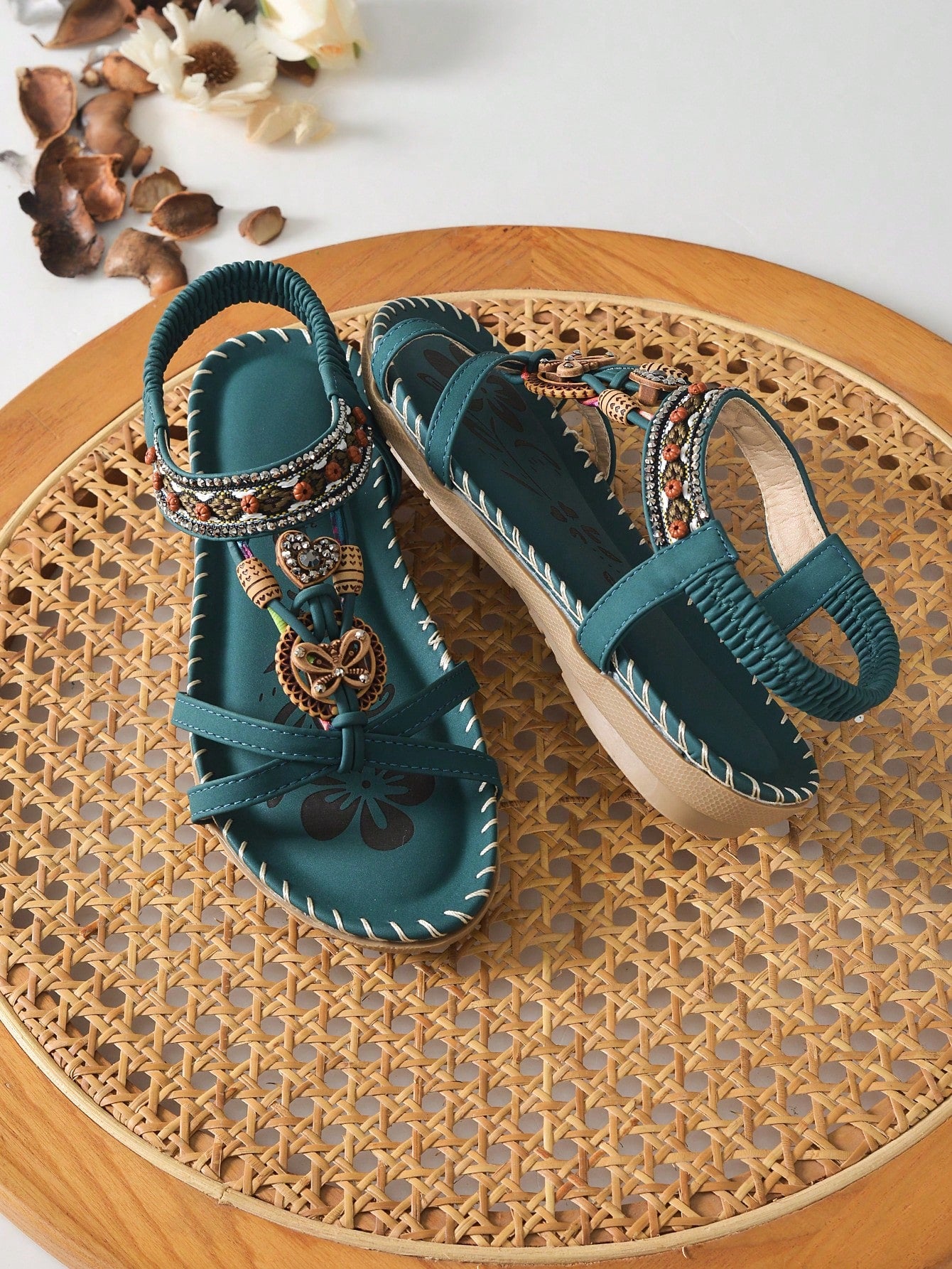 Women's malachite green bohemian flat thong sandals with rhinestone toe ring and slip-on design for beach and summer wear
