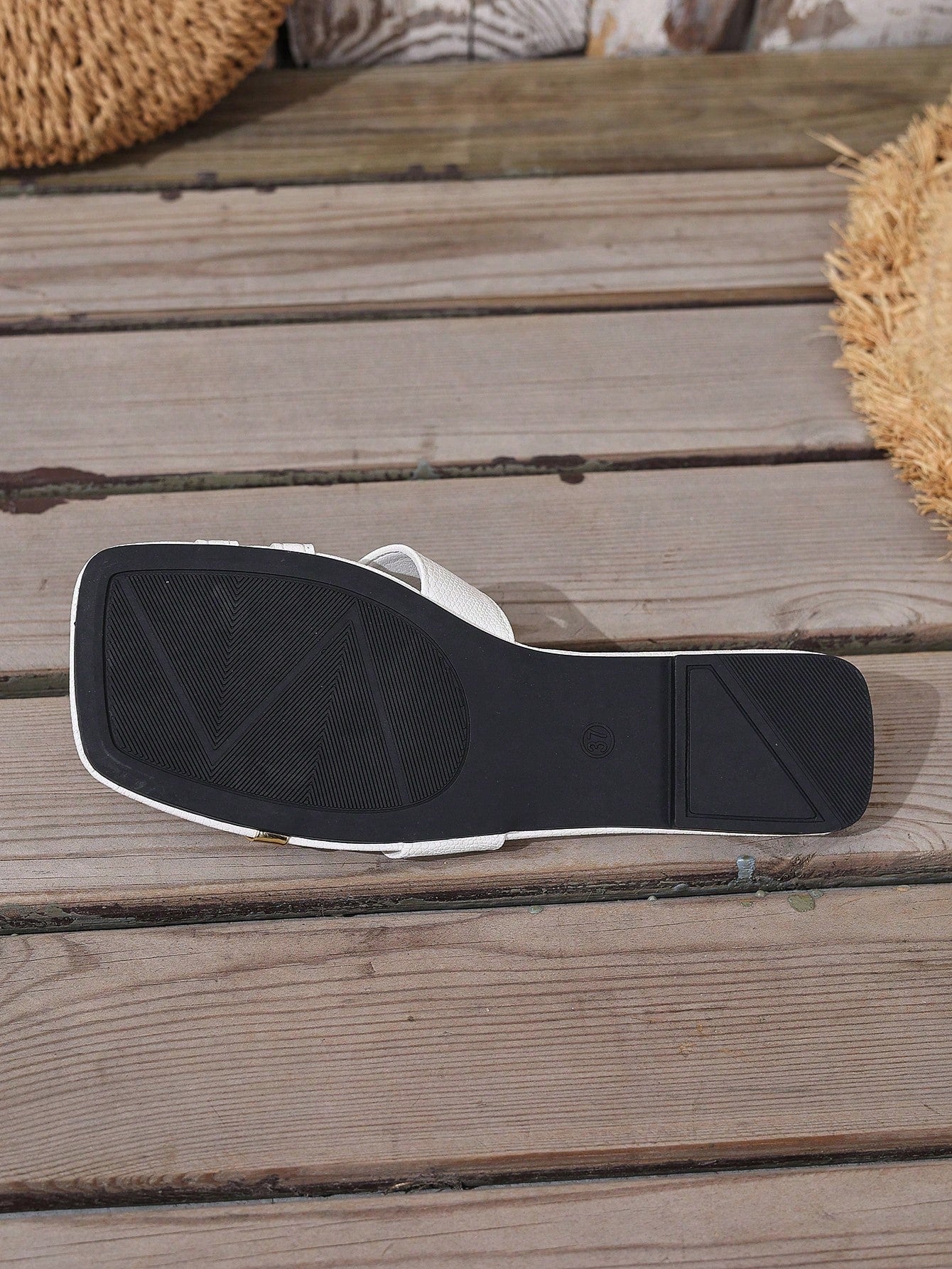 Women's yellow open-toe flat slide sandals featuring a cut-out design and textured plain pattern for casual beach and daily wear.