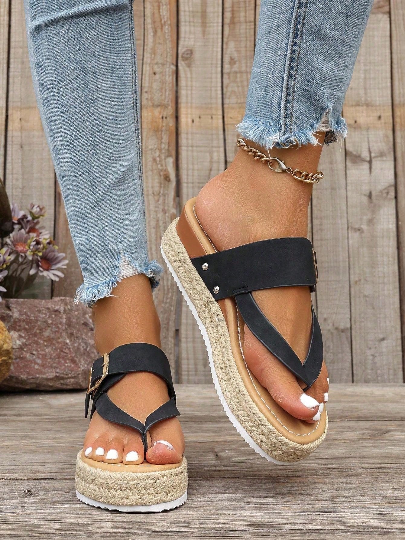 Women's thick sole flip flop sandals with adjustable buckle strap, toe post design, and flatform mid heel in a casual vacation style.