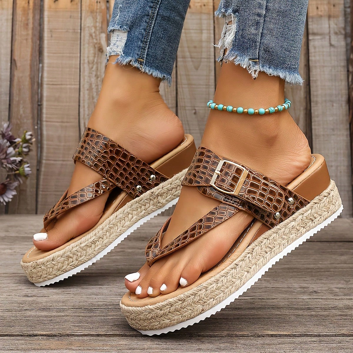 Women's thick sole flip flop sandals with adjustable buckle strap, toe post design, and flatform mid heel in a casual vacation style.