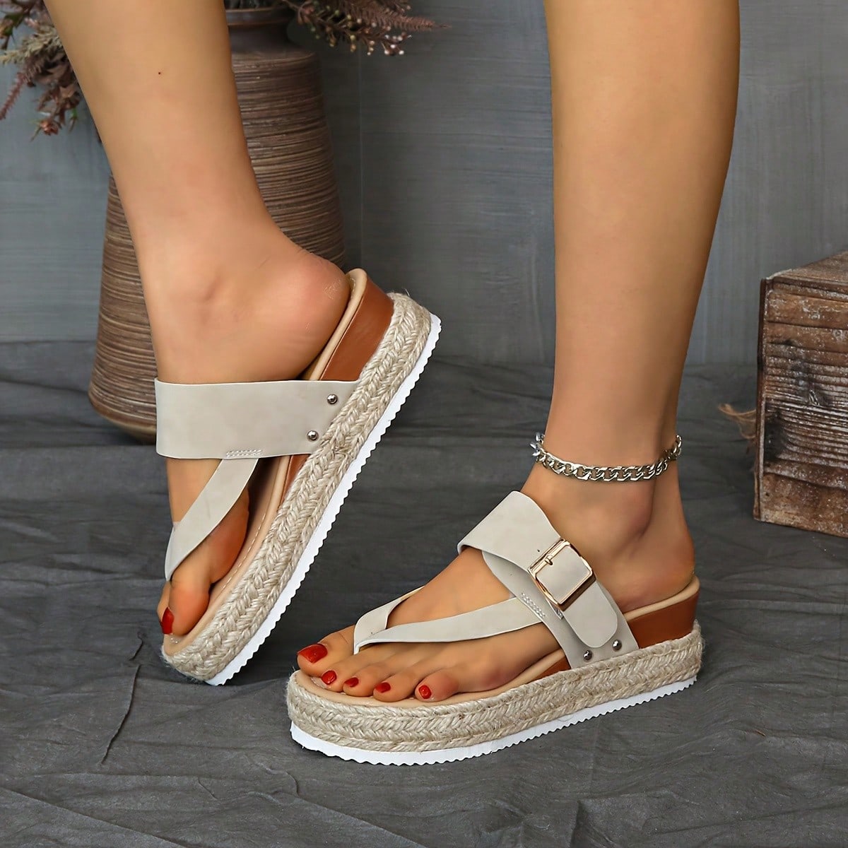 Women's thick sole flip flop sandals with adjustable buckle strap, toe post design, and flatform mid heel in a casual vacation style.
