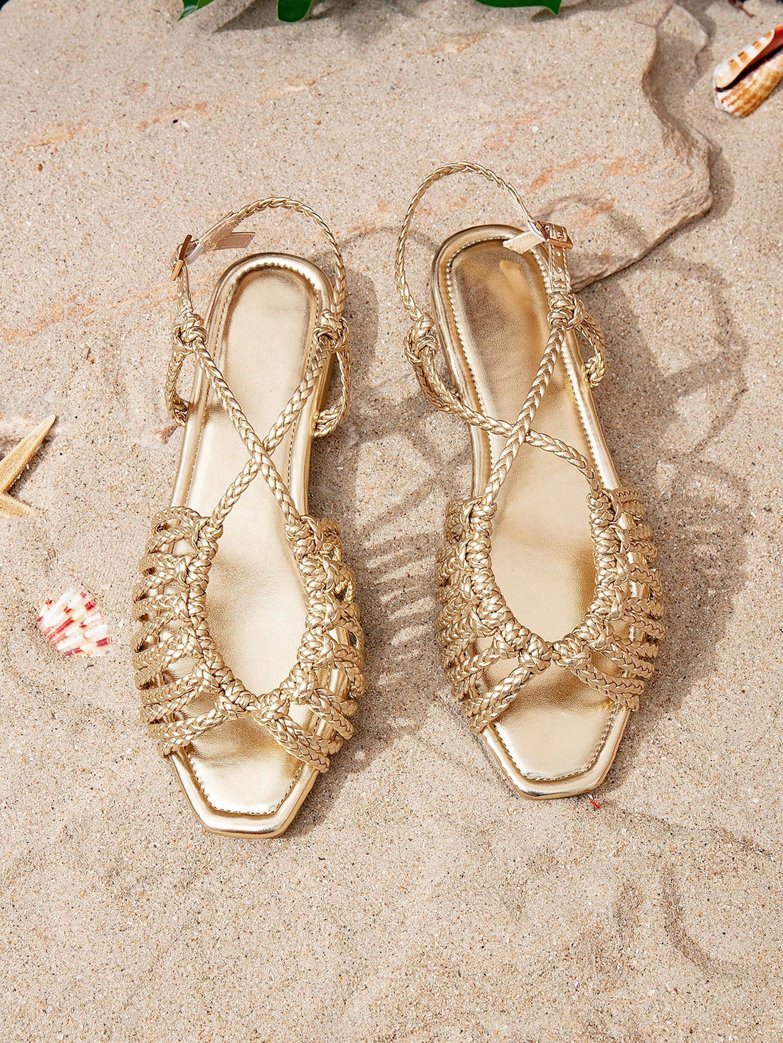 Gold women’s flat gladiator sandals with square open toe, woven hollow-out cutout design, and backstrap, lightweight breathable style for beach, vacation, and party wear.