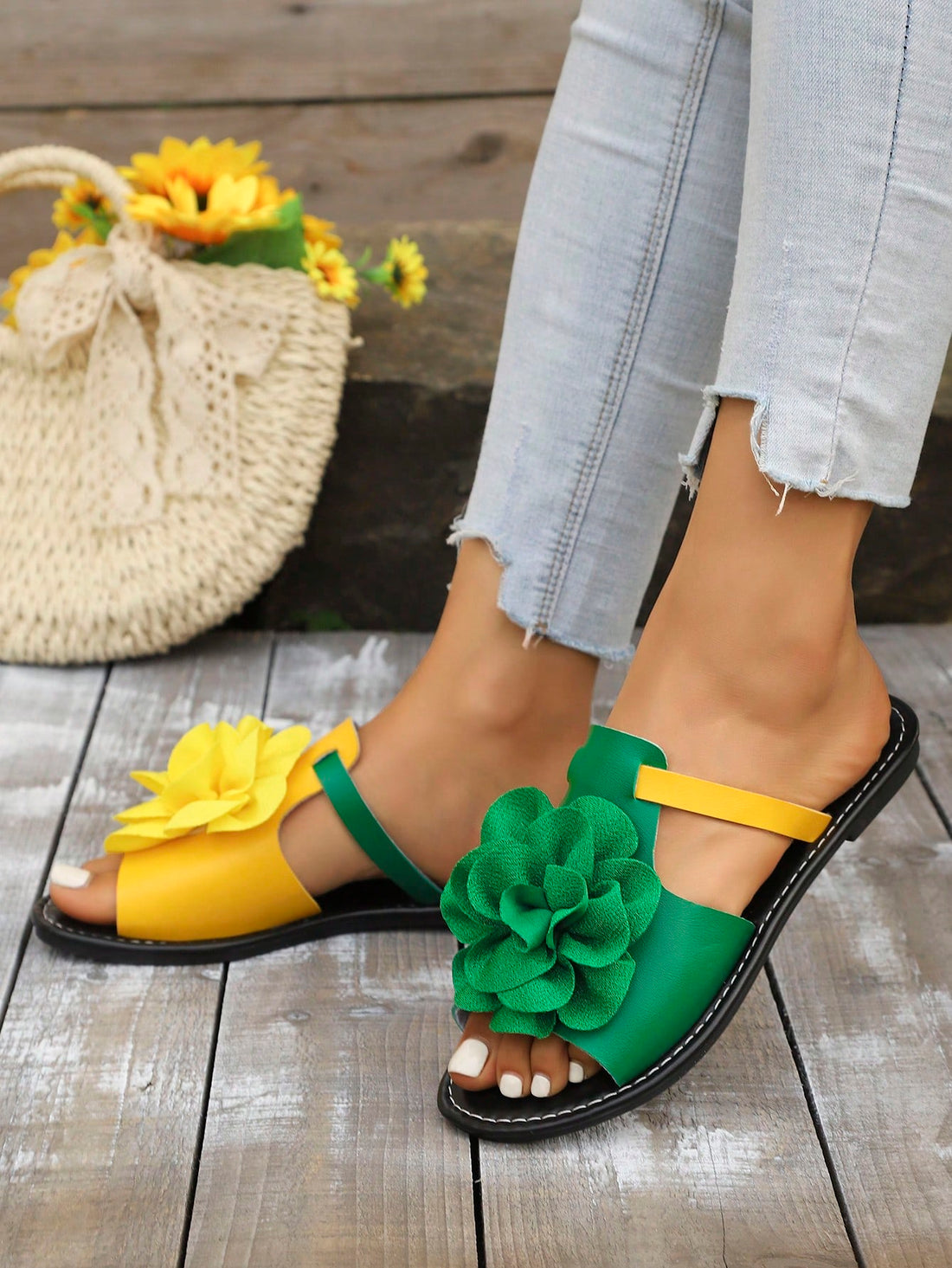 Women's multicolor peep toe flat slide sandals with floral appliques, open toe design, and plant pattern details for beach and casual wear.