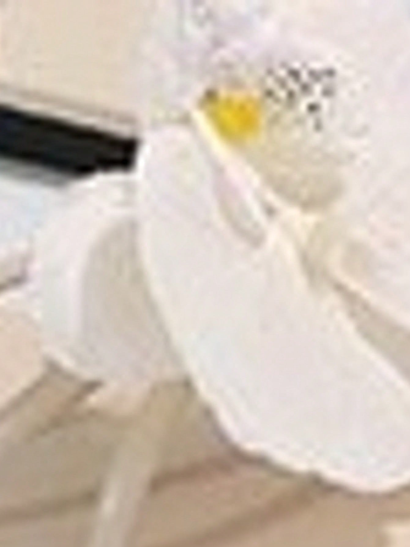 Women's flat slide sandals with open toe, floral applique detail, and criss-cross straps, shown as casual vacation-style summer footwear.