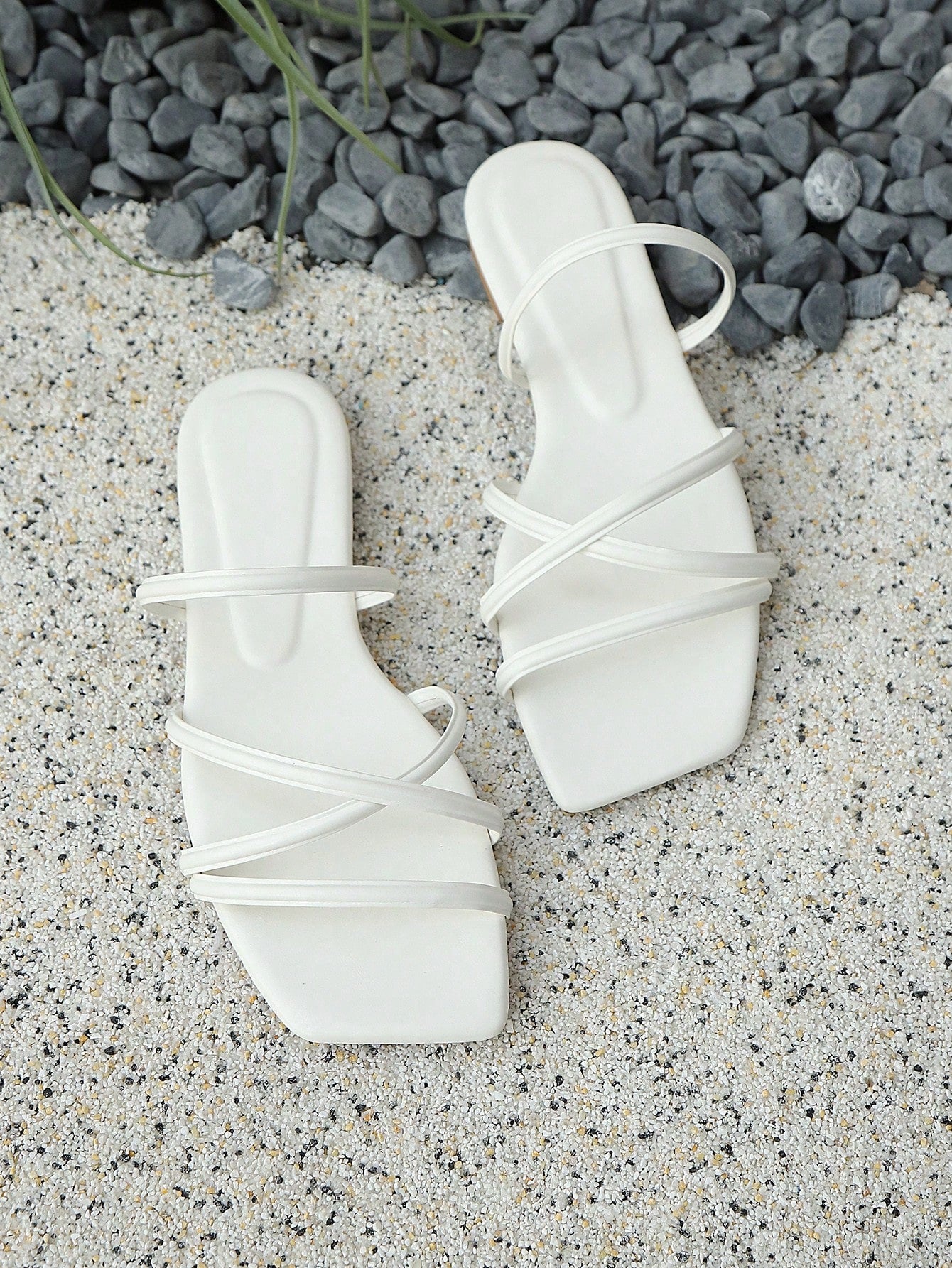 Women's flat square-toe sandals with criss-cross strappy design and open toe, beach-style slide sandals with ankle-strap look for casual outdoor wear.