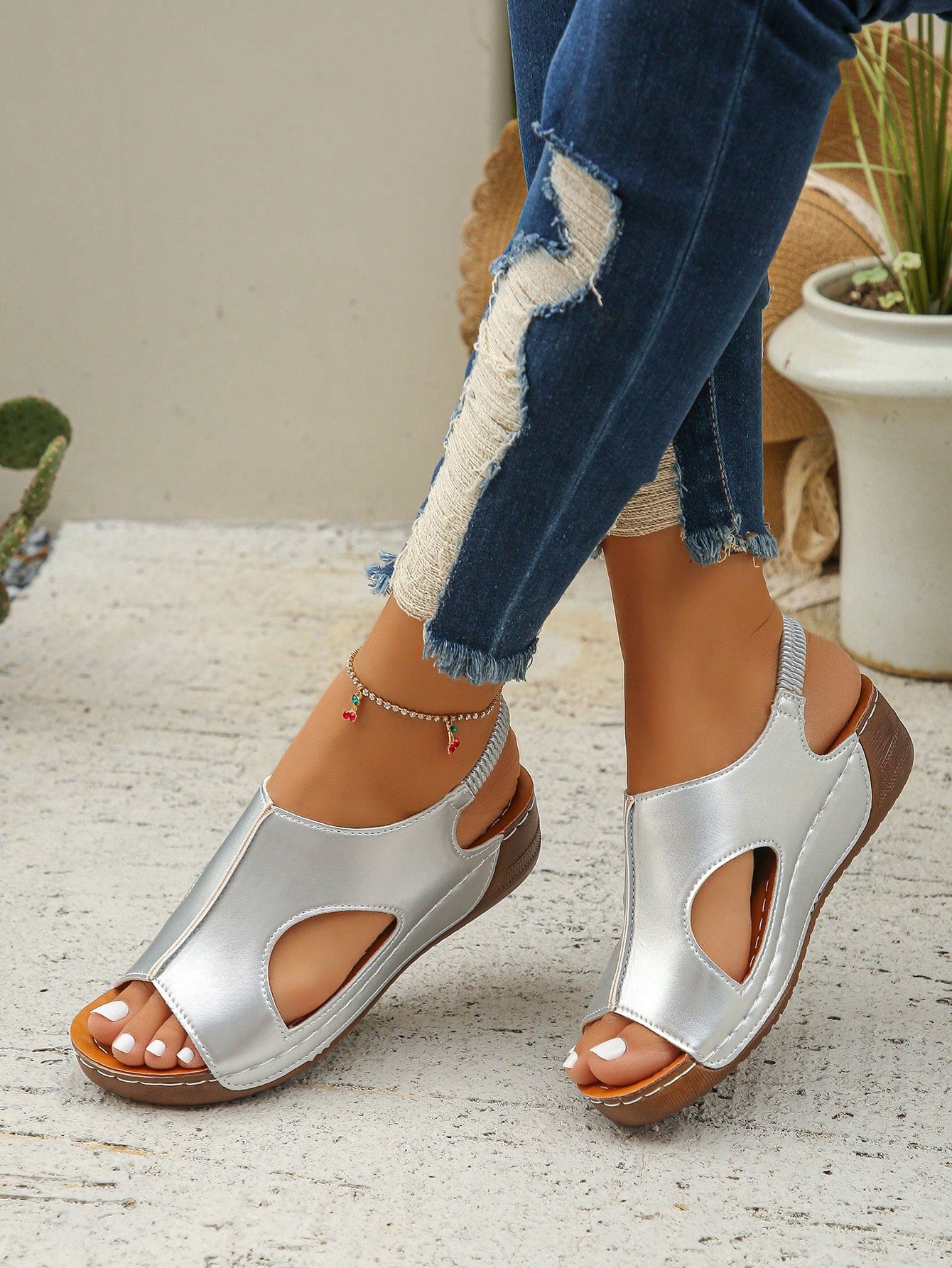 Women’s white PU platform wedge sandals with slip-on design, slingback strap, open round toe, and cut-out details, suitable for beach and vacation wear.