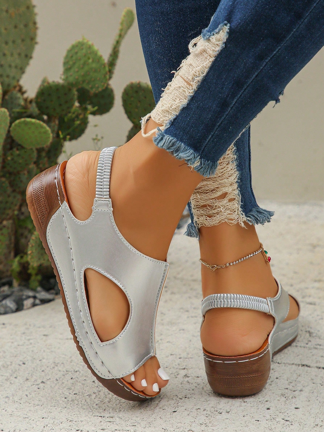 Women’s white PU platform wedge sandals with slip-on design, slingback strap, open round toe, and cut-out details, suitable for beach and vacation wear.