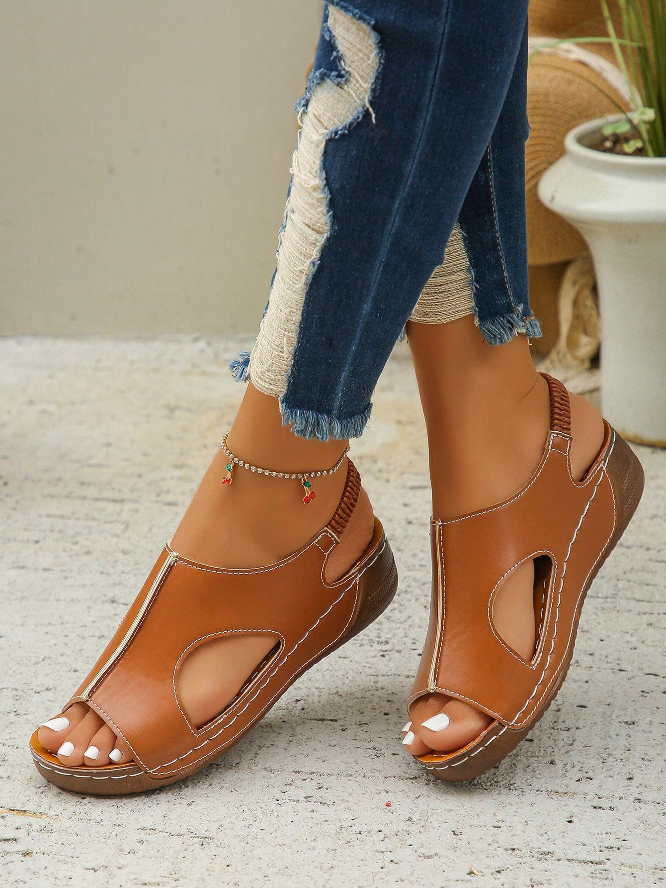 Women’s white PU platform wedge sandals with slip-on design, slingback strap, open round toe, and cut-out details, suitable for beach and vacation wear.