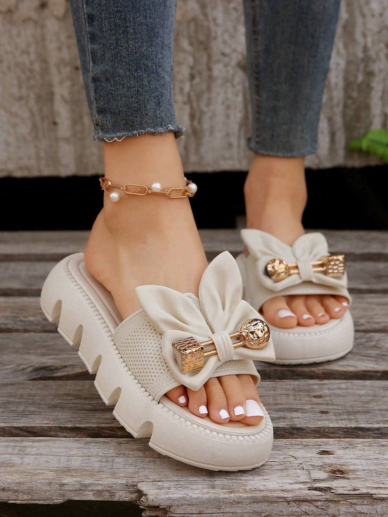 Women's plus size thick sole slip-on sandals with bowknot detail, open toe design, low heel, and PU leather upper.
