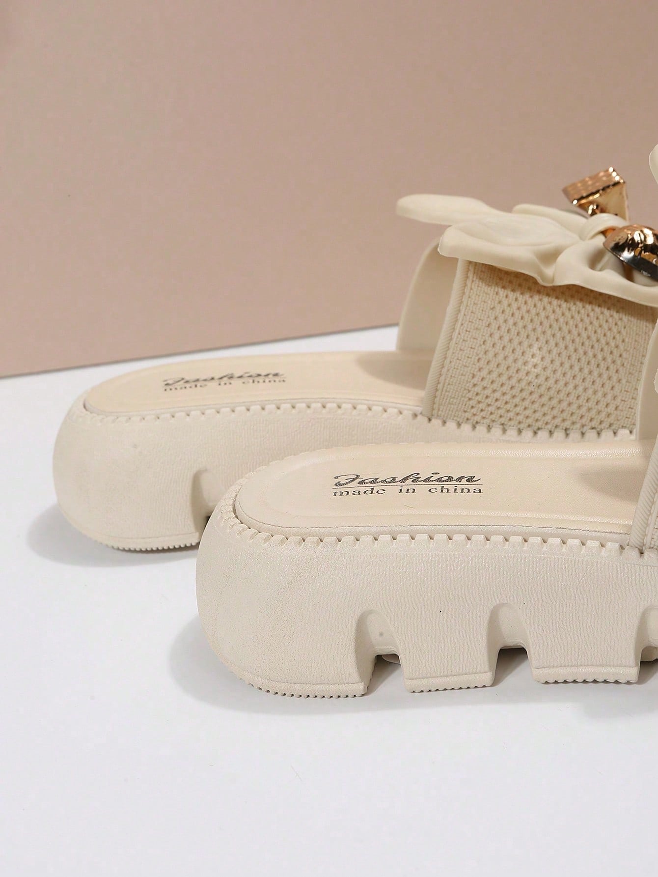 Women's plus size thick sole slip-on sandals with bowknot detail, open toe design, low heel, and PU leather upper.