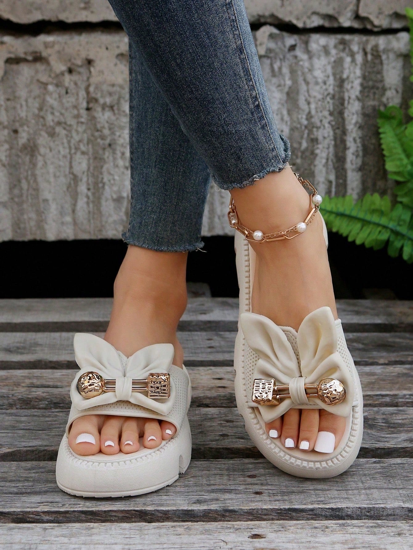 Women's plus size thick sole slip-on sandals with bowknot detail, open toe design, low heel, and PU leather upper.