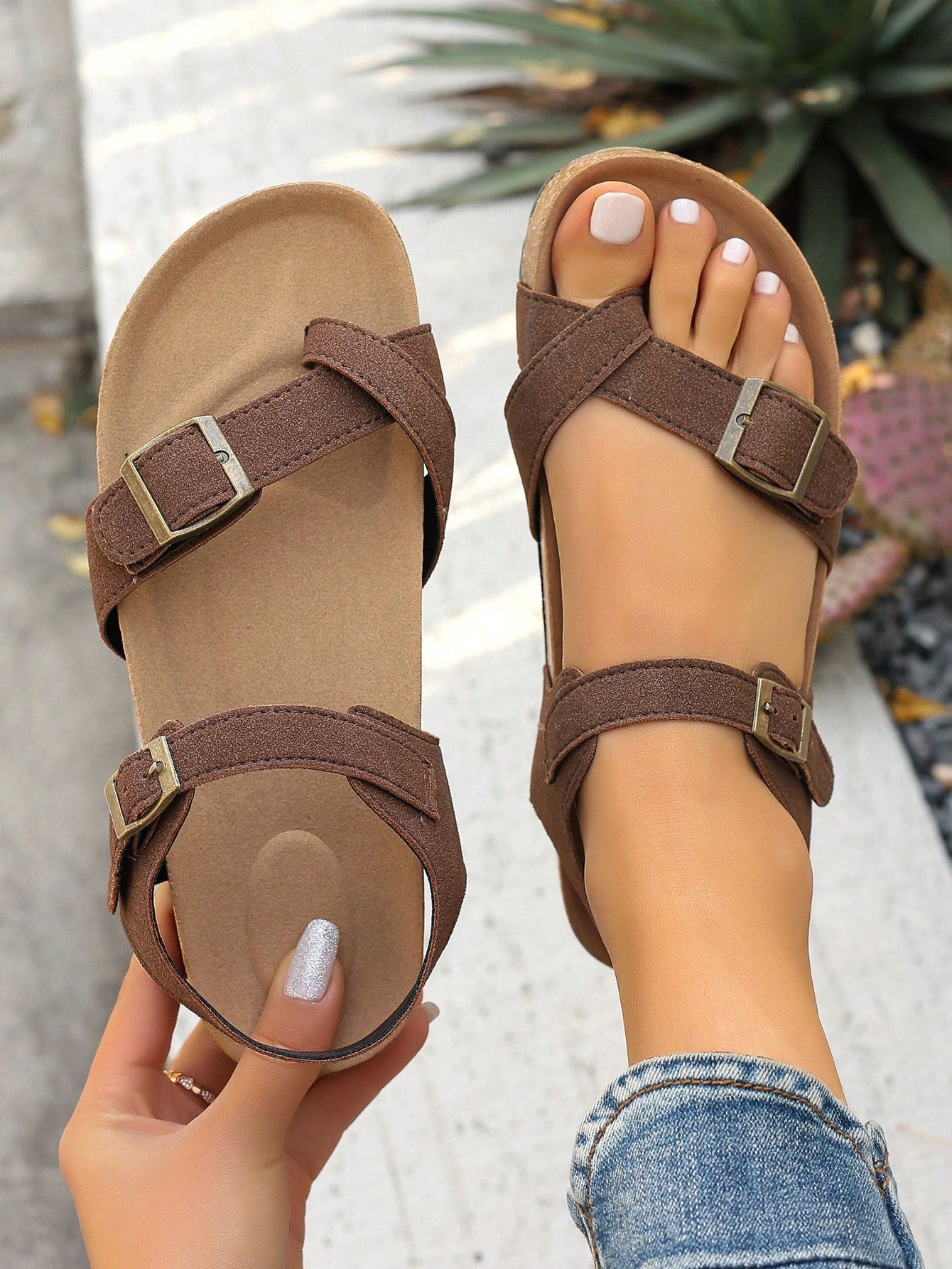 Women's plus size slip-on gladiator flat sandals with open toe and buckle detail, designed for beach and vacation wear.