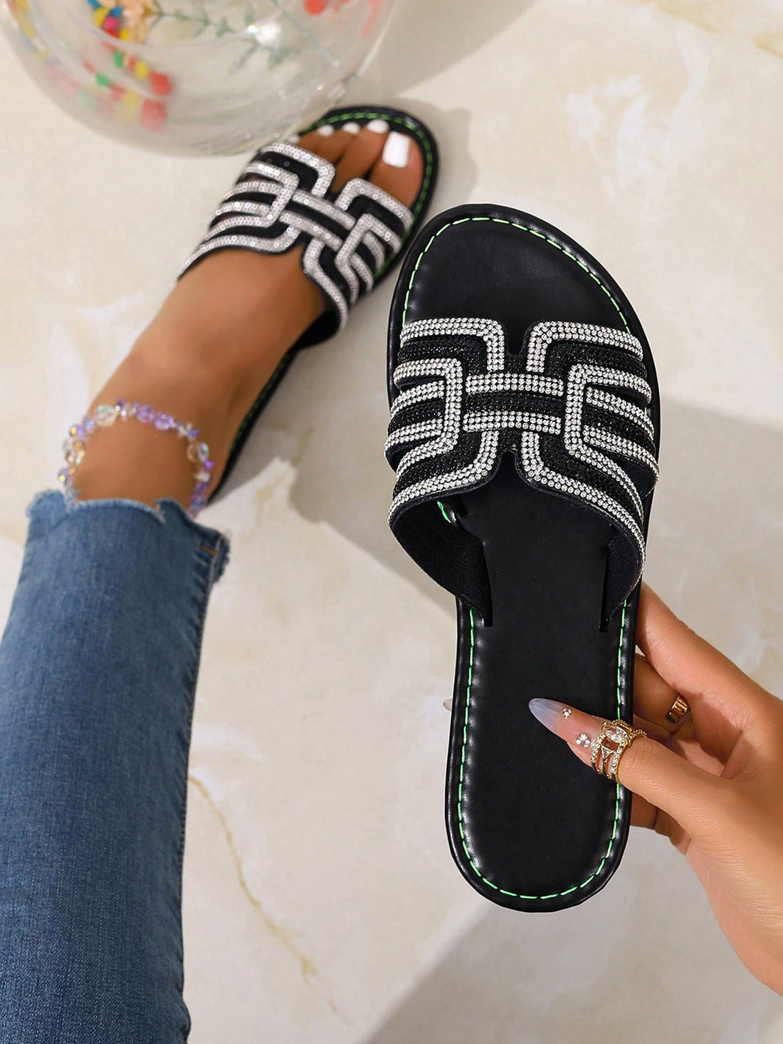 Women's casual flat slip-on slide sandals featuring an open toe design and chain detail, suitable for outdoor summer wear.