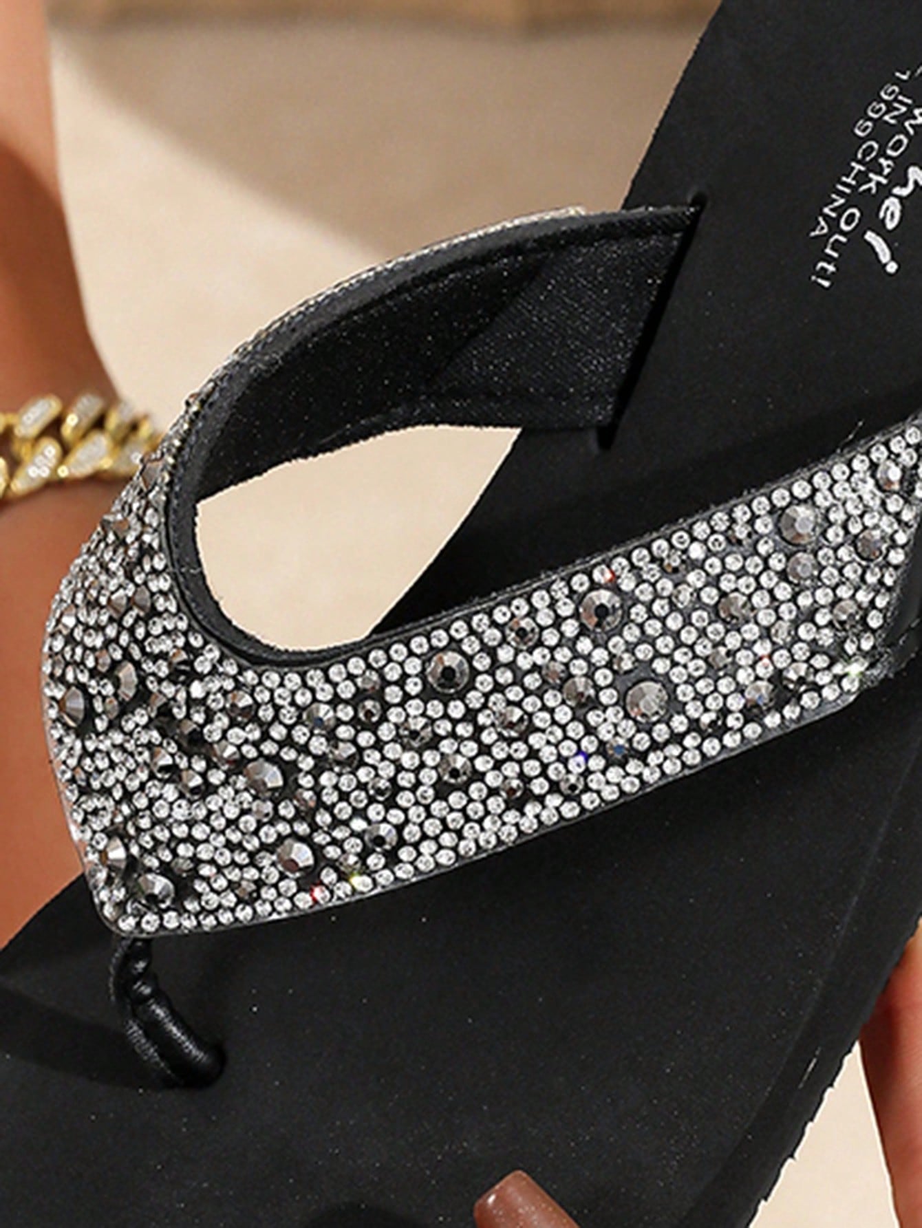 Women's pearl decor thong sandals with rhinestone embellishments, strappy slip-on design, and wedge heel, suitable for beach and wedding wear.