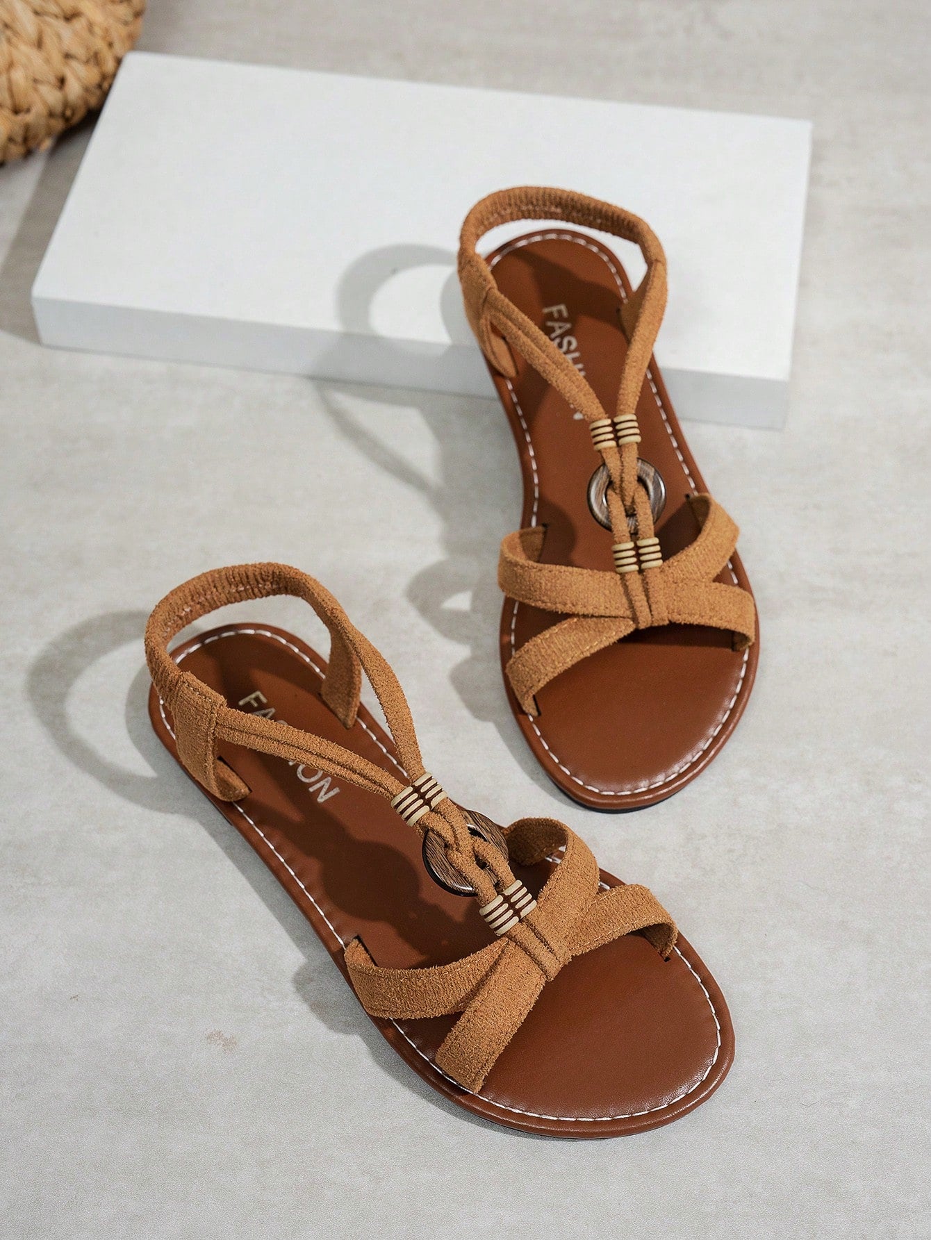 Women's beaded open-toe thong flat sandals in slip-on style for outdoor and beach casual wear.
